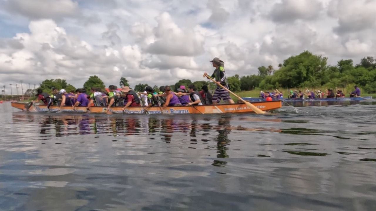 Dragon boat competition in Orlando partners cops with teenagers thumbnail