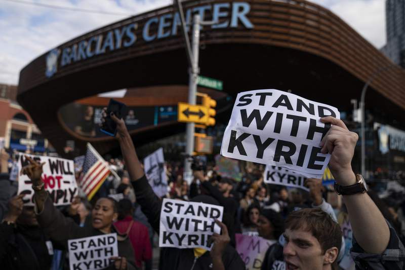 Demonstrators support Irving vs vaccine mandate at Nets game