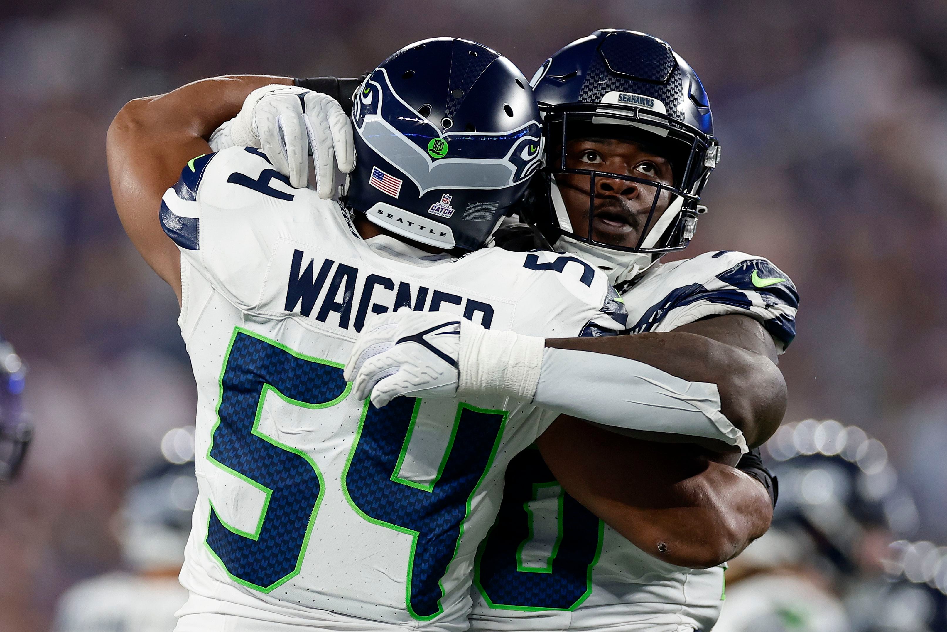 Rookie Devon Witherspoon scores on 97-yard pick-6 as Seahawks' defense  leads Seattle over Giants, Sports