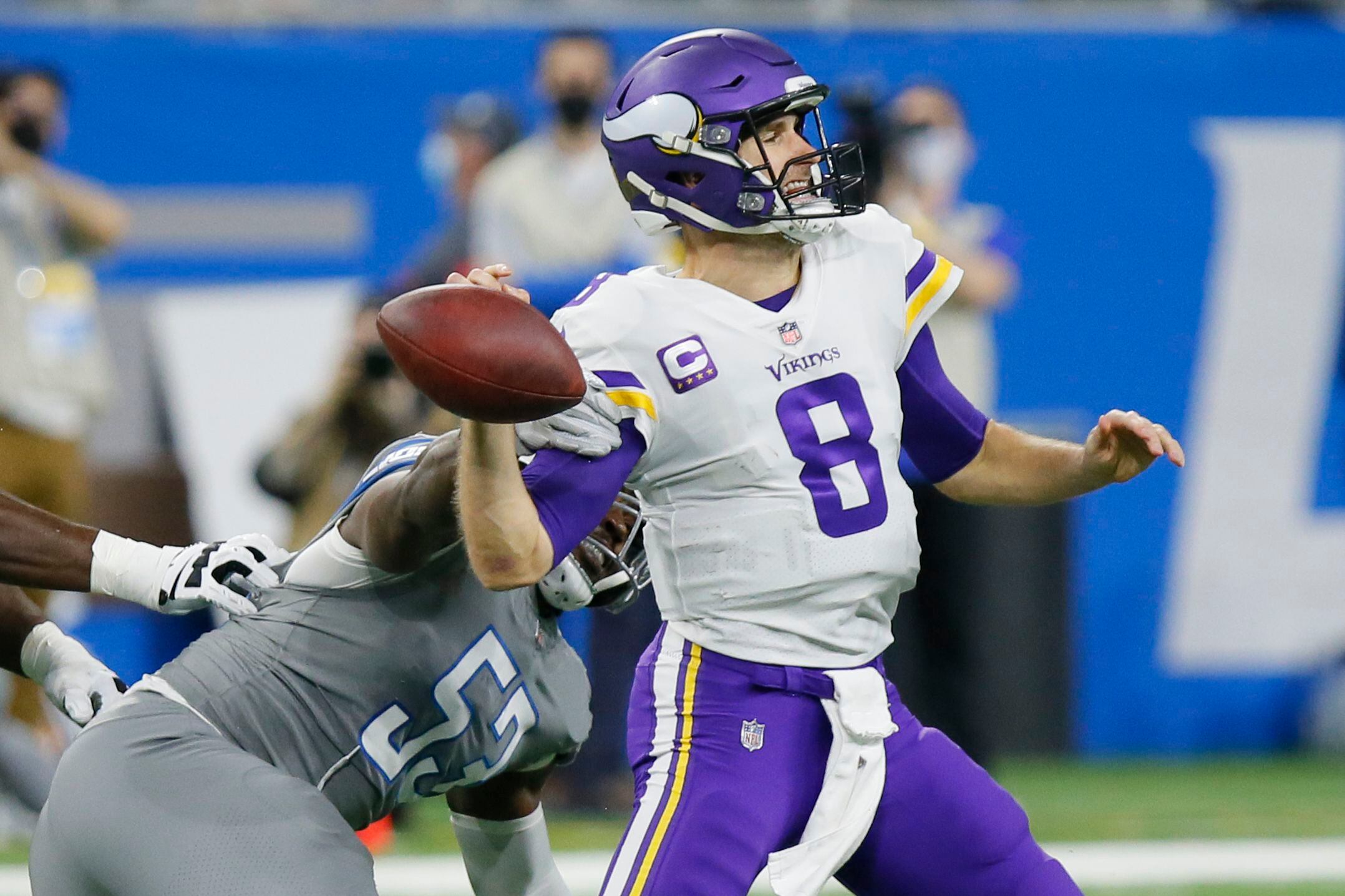 DETROIT, MI - DECEMBER 5: Minnesota Vikings WR (18) Justin Jefferson goes  up high to catch a pass with Detroit Lions CB Jerry Jacobs (39) during NFL  game between Minnesota Vikings and