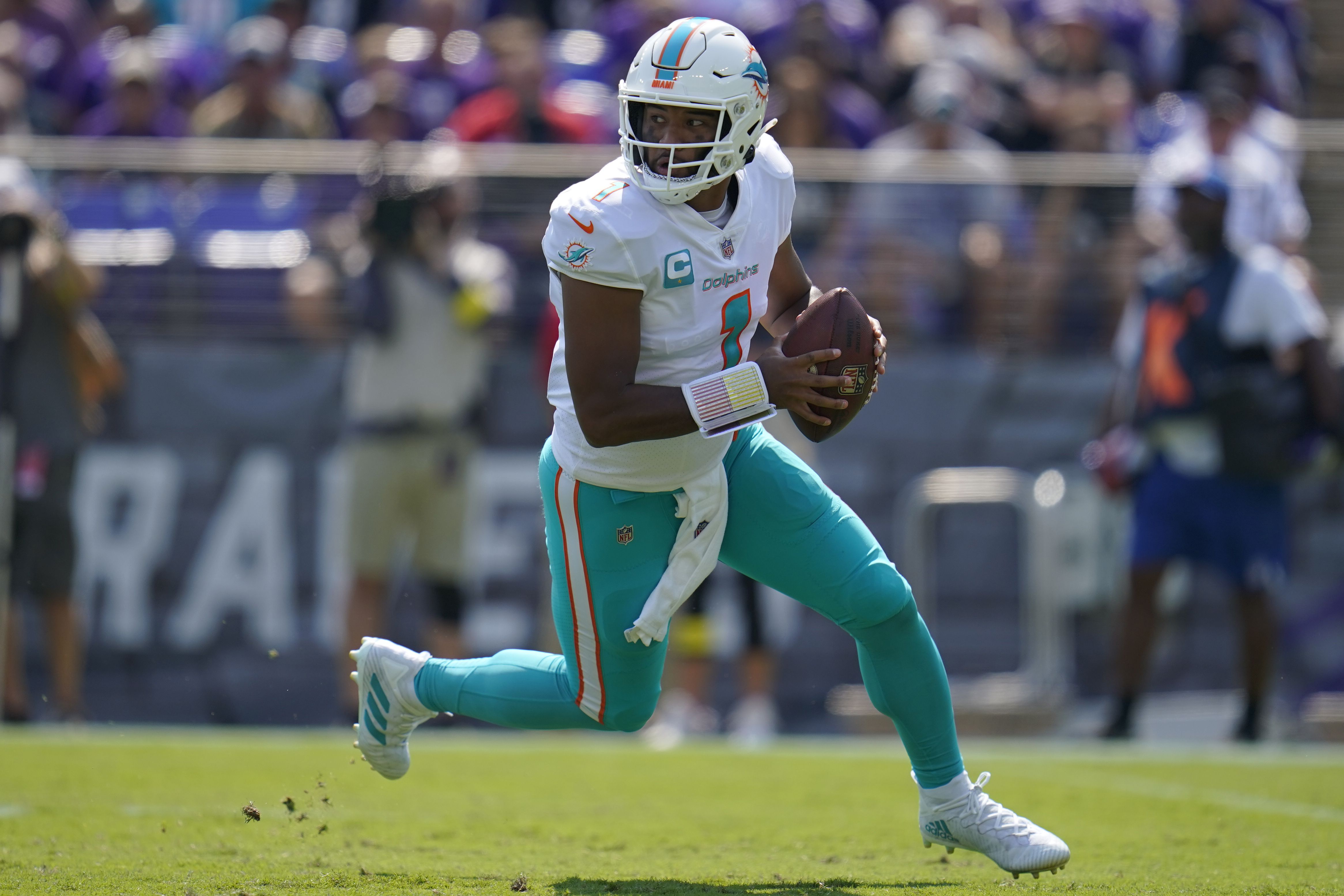 MONDAY HUDDLE: Tagovailoa outshines former college teammate in promising  start for Dolphins