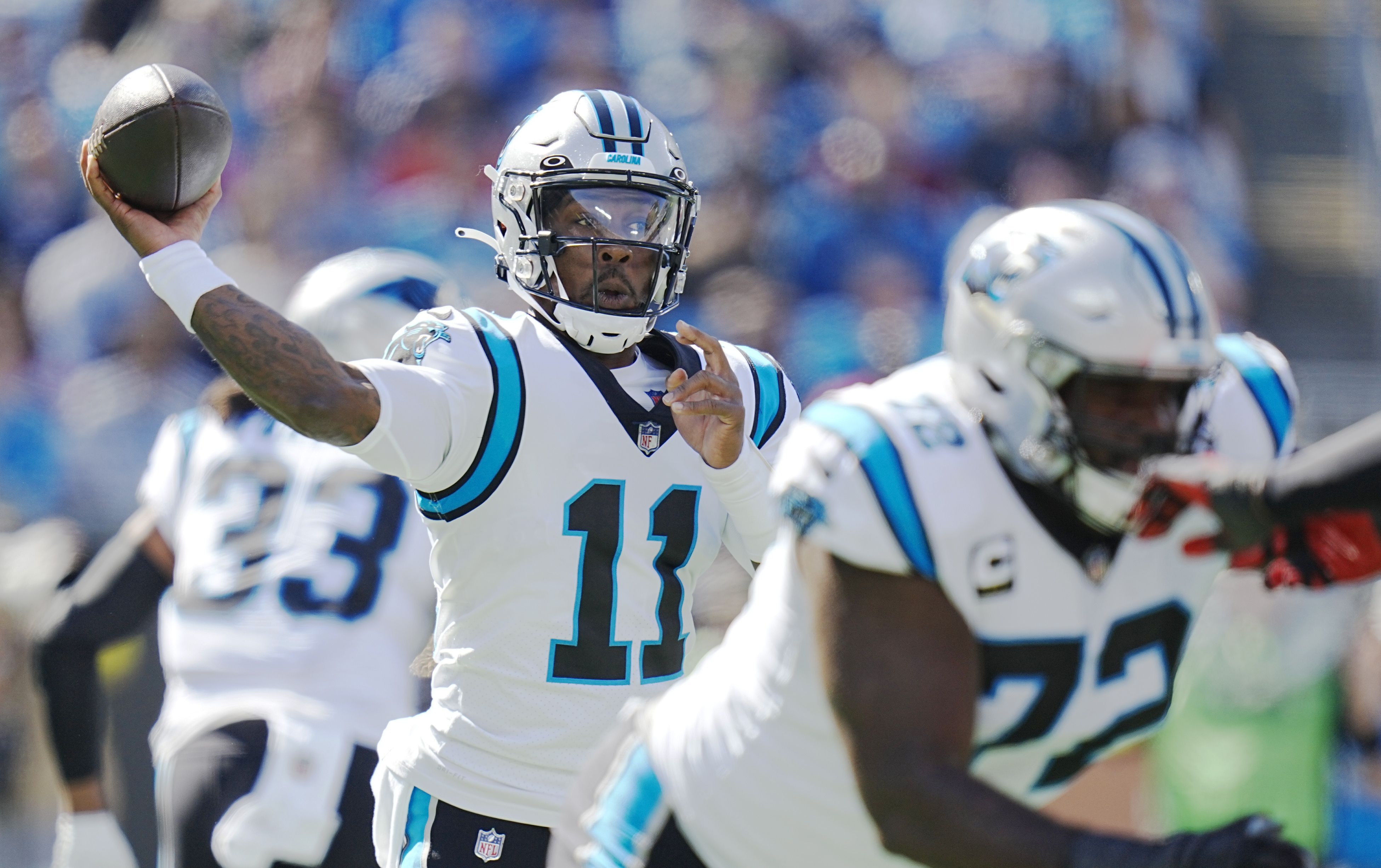 Carolina Panthers quarterback Sam Darnold (14) throws during an NFL  football game between the Carolina Panthers and the Denver Broncos on  Sunday, Nov. 27, 2022, in Charlotte, N.C. (AP Photo/Jacob Kupferman Stock