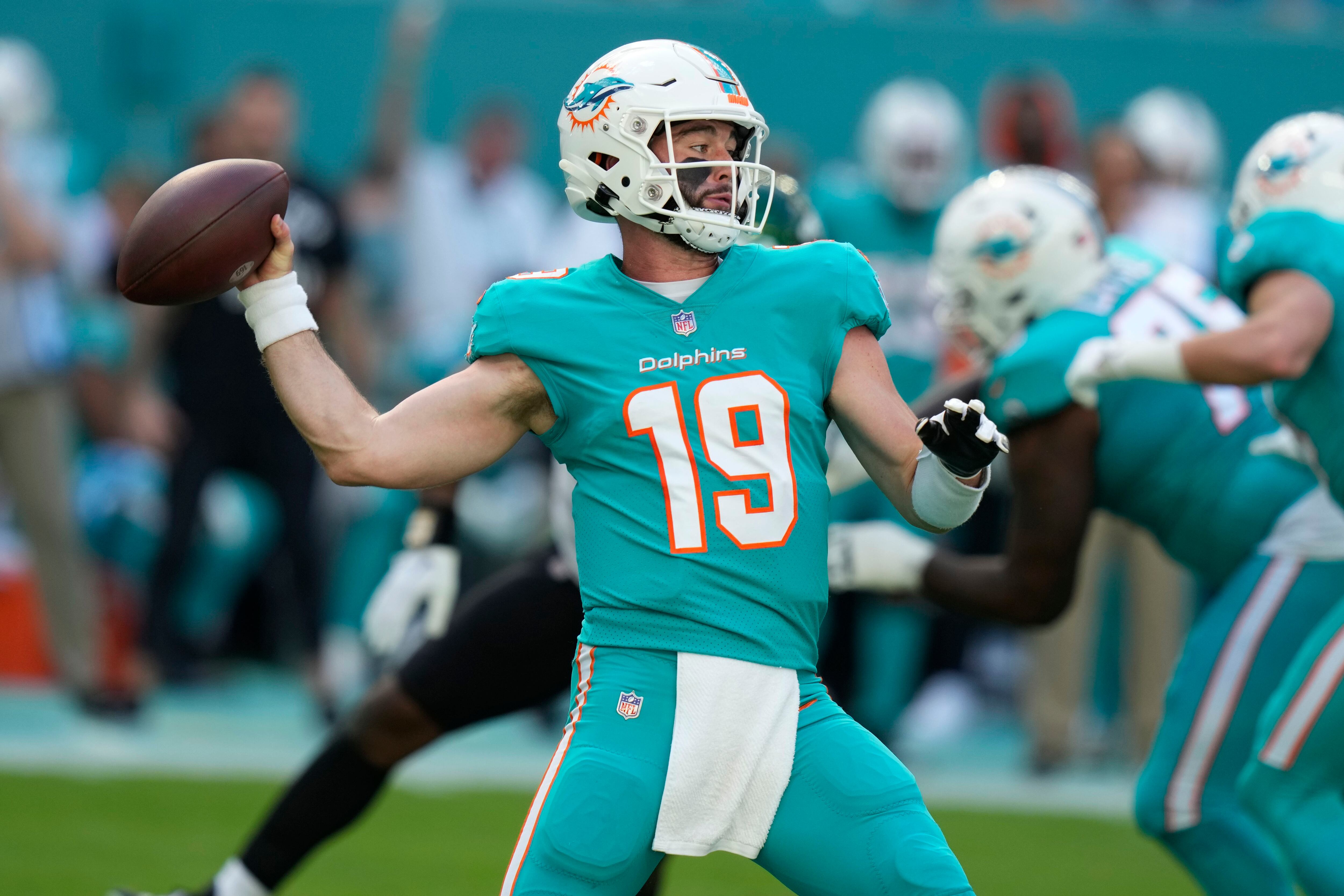 Dugger INT return helps lift Pats over fading Dolphins 23-21