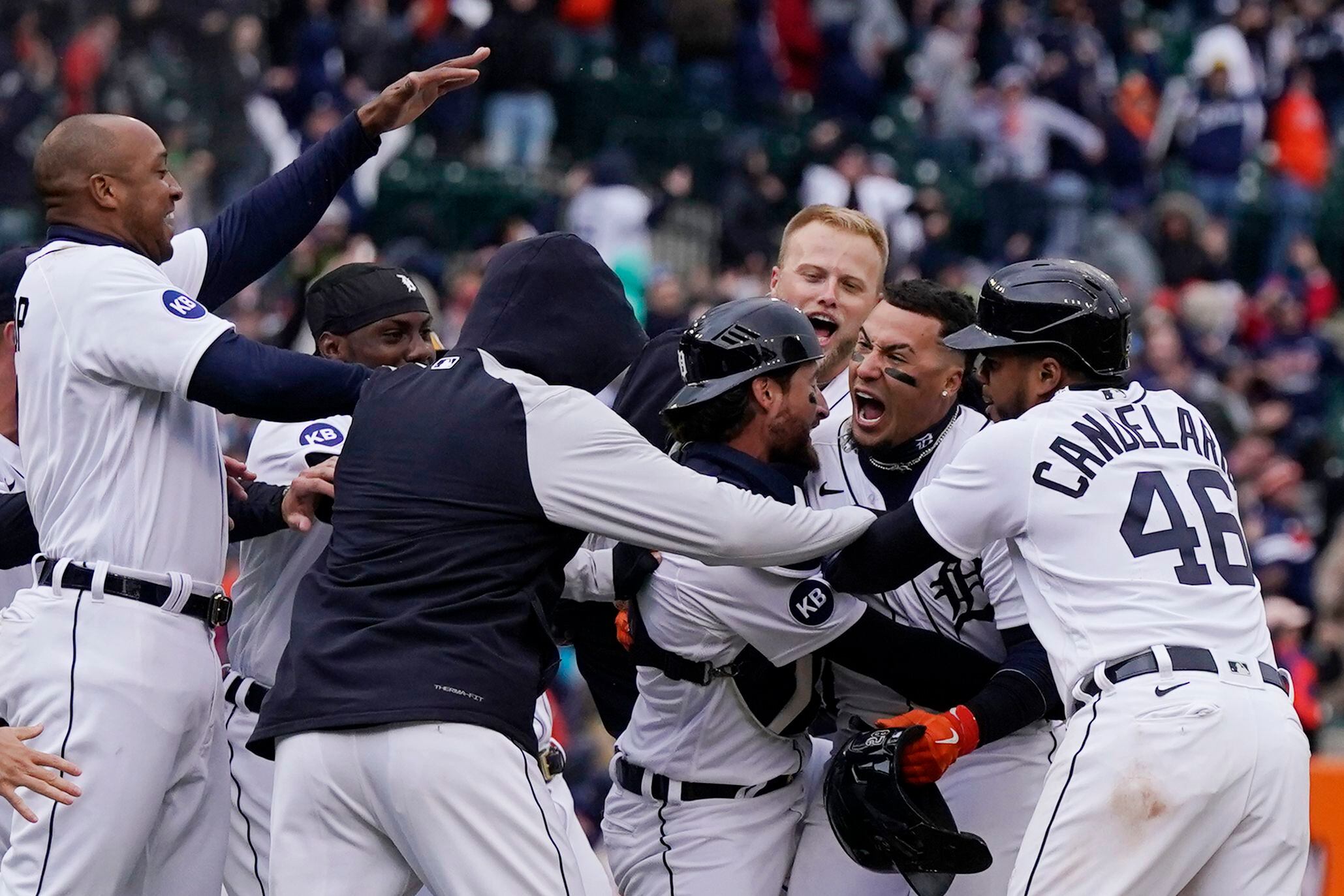 Detroit Tigers shortstop Javier Baez (28) waves to fans after a