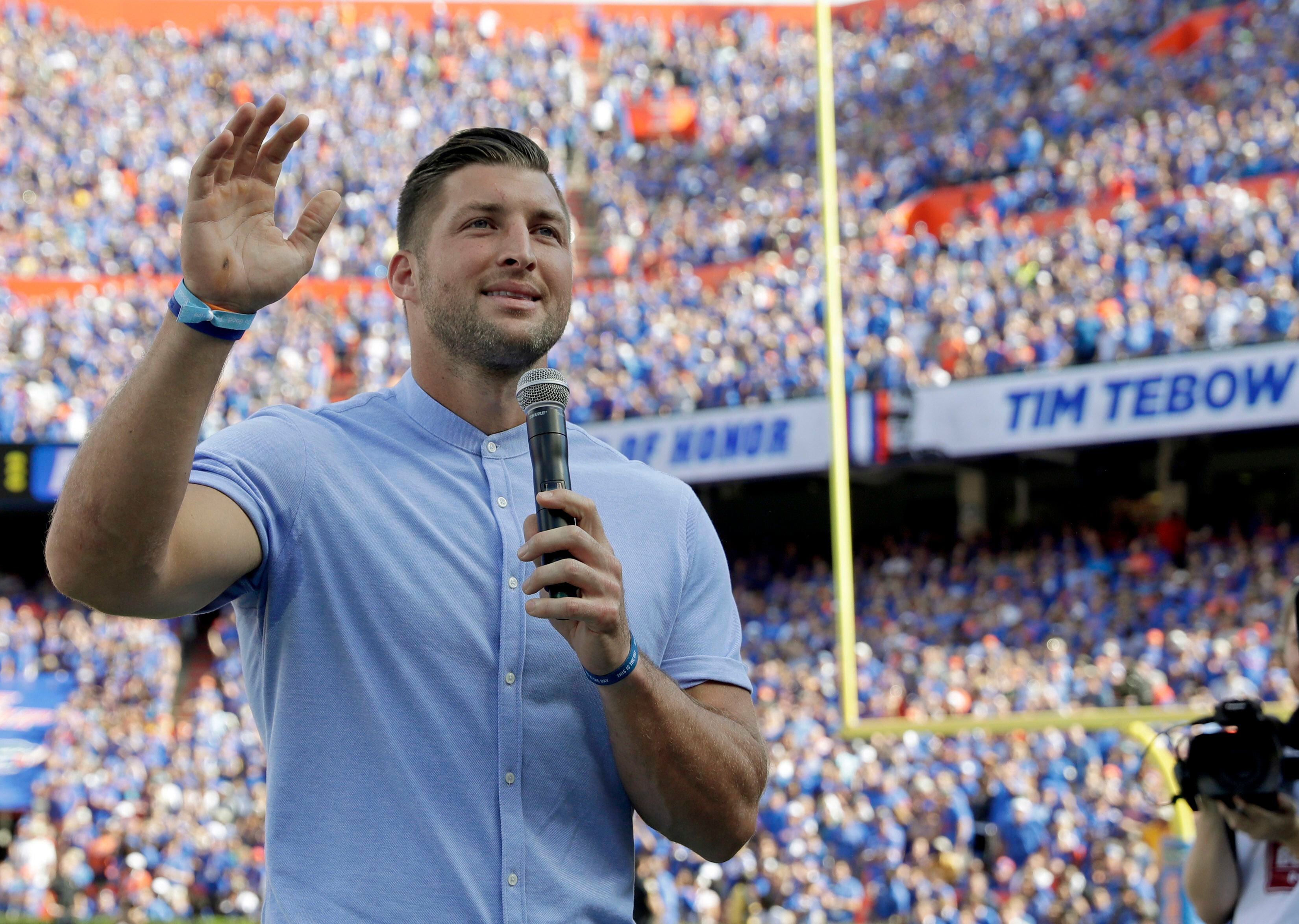 Tim Tebow shares thoughts on Urban Meyer at Ohio bar video - Sports  Illustrated