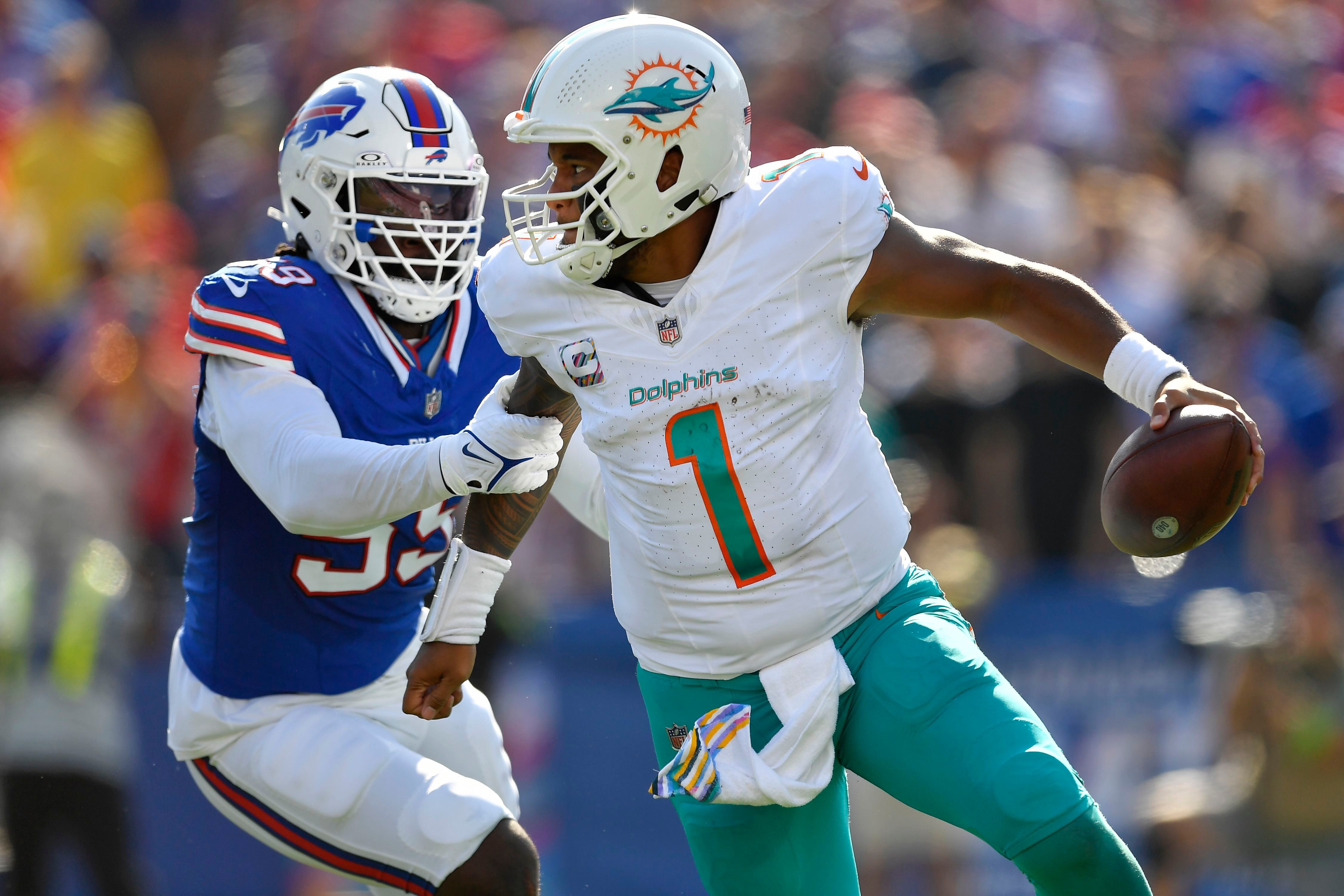 Josh Allen throws for four touchdowns, runs for a fifth as Bills deliver  Dolphins' first loss in a rout - The Boston Globe