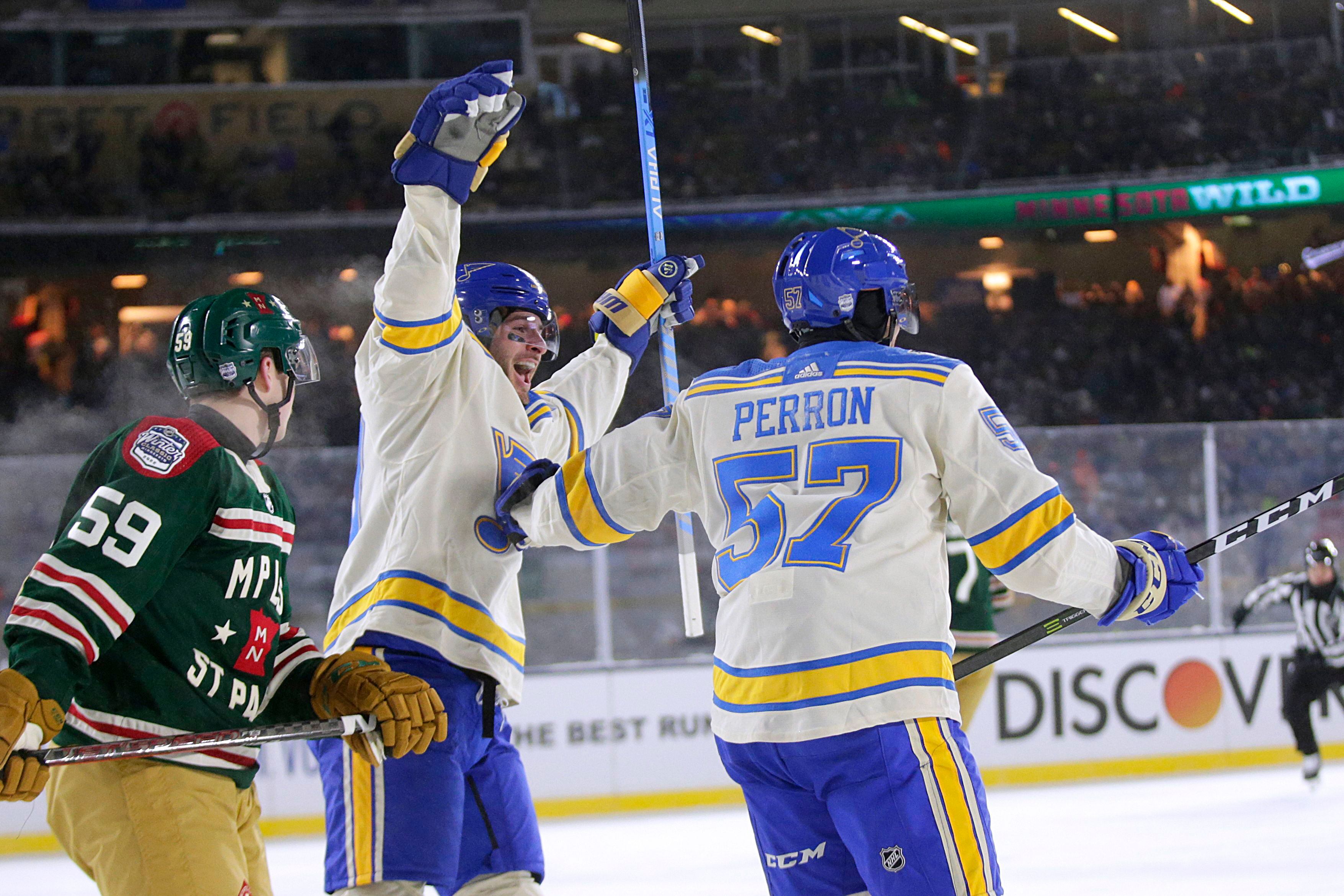 PHOTO: Blues warm up in Cardinals-themed jerseys