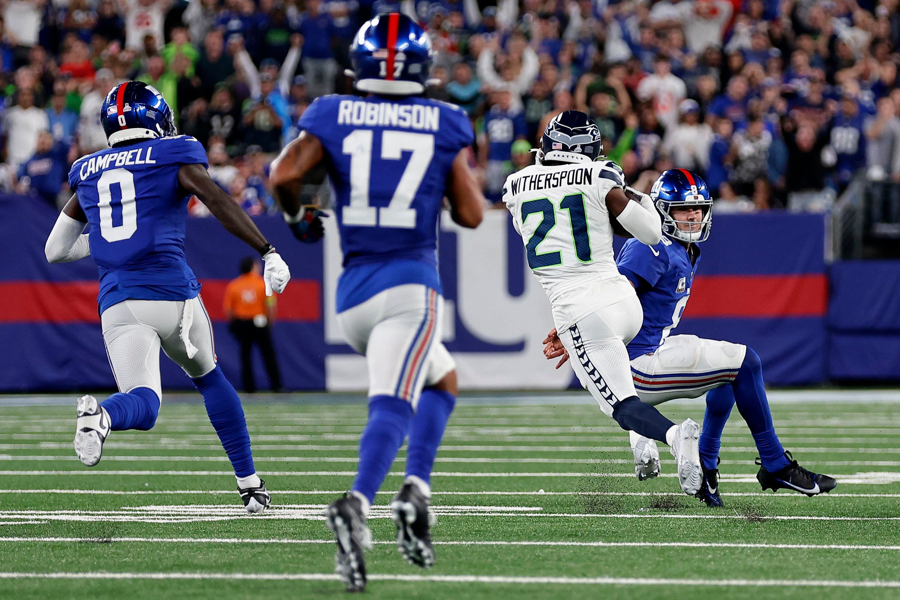 Rookie Devon Witherspoon scores on 97-yard pick six as Seahawks D