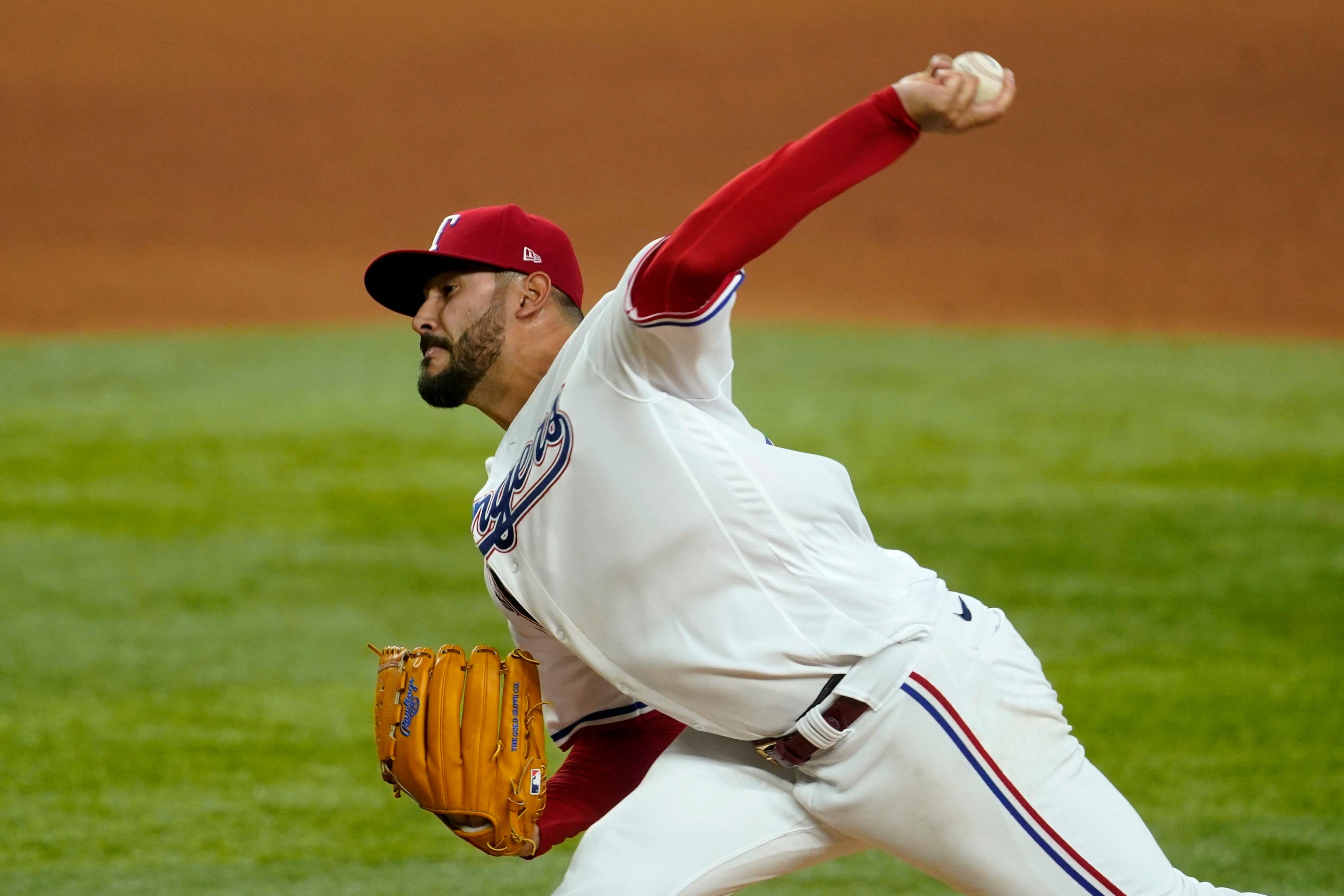 Texas Rangers' Corey Seager rounds the bases after hitting a solo home run  during a baseball game against the Houston Astros, Thursday, April 28,  2022, in Arlington, Texas. (AP Photo/Tony Gutierrez Stock