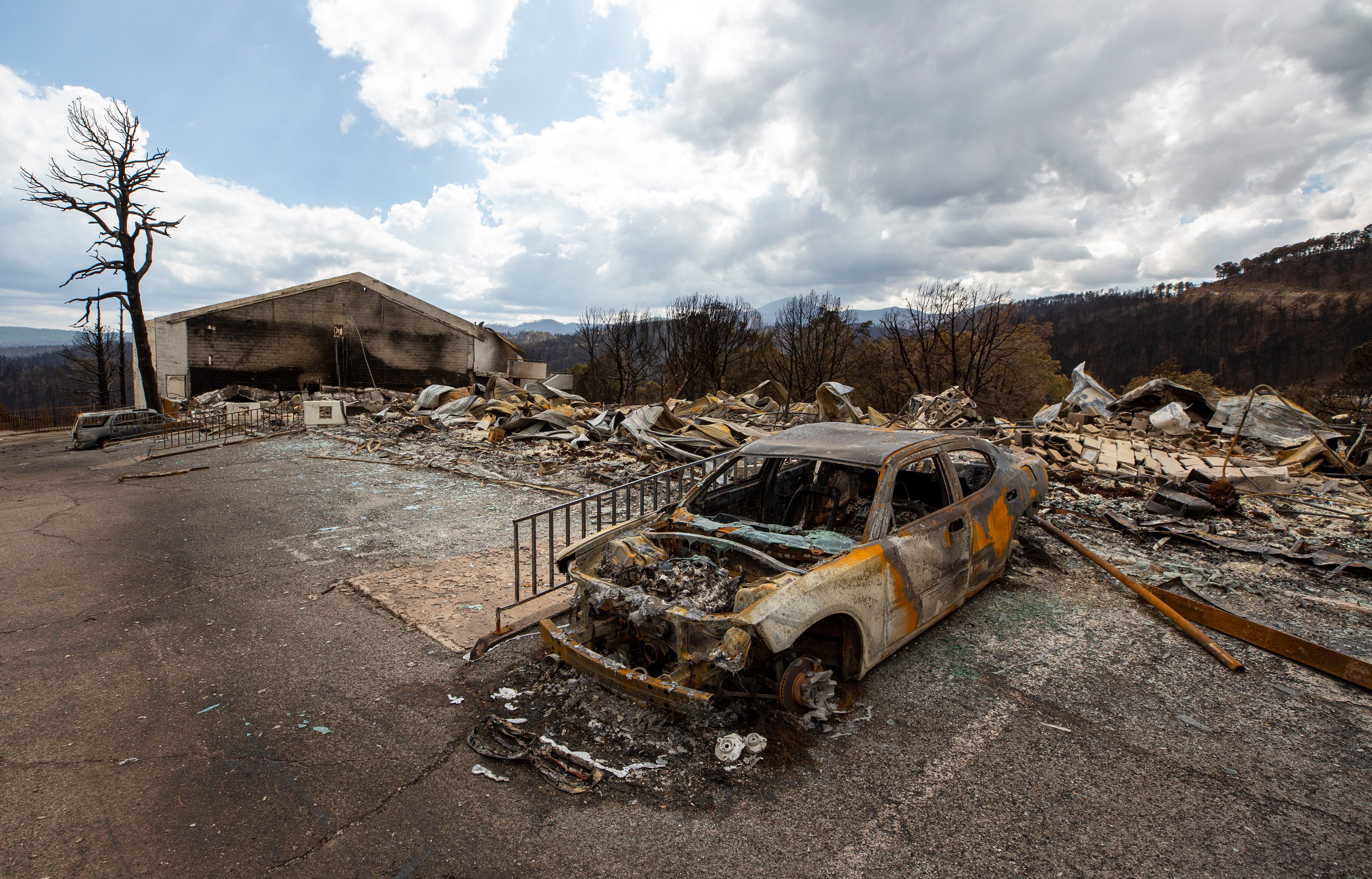 No human remains are found as search crews comb rubble from New Mexico wildfires thumbnail