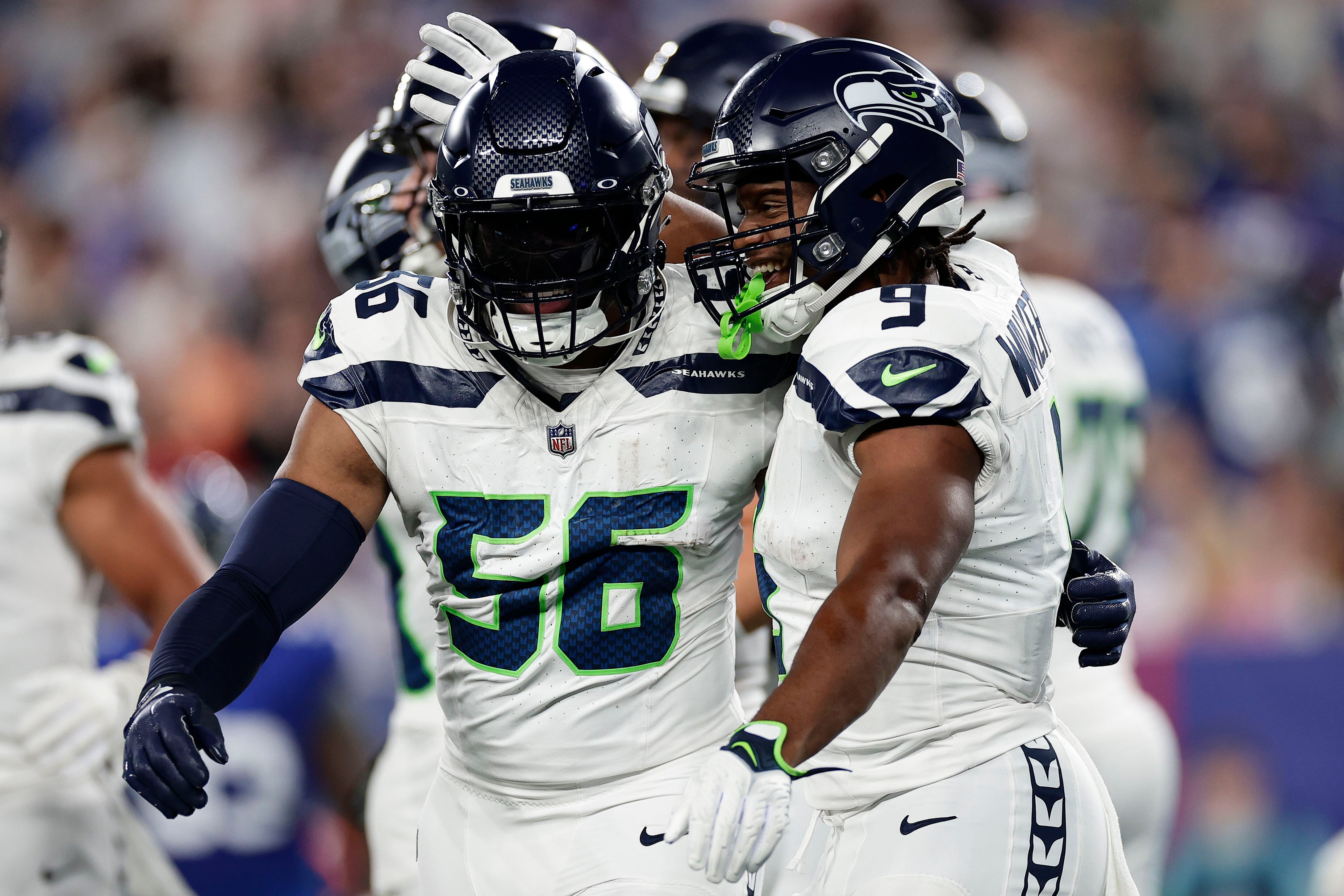 Seattle Seahawks linebacker Jordyn Brooks (56) looks downfield