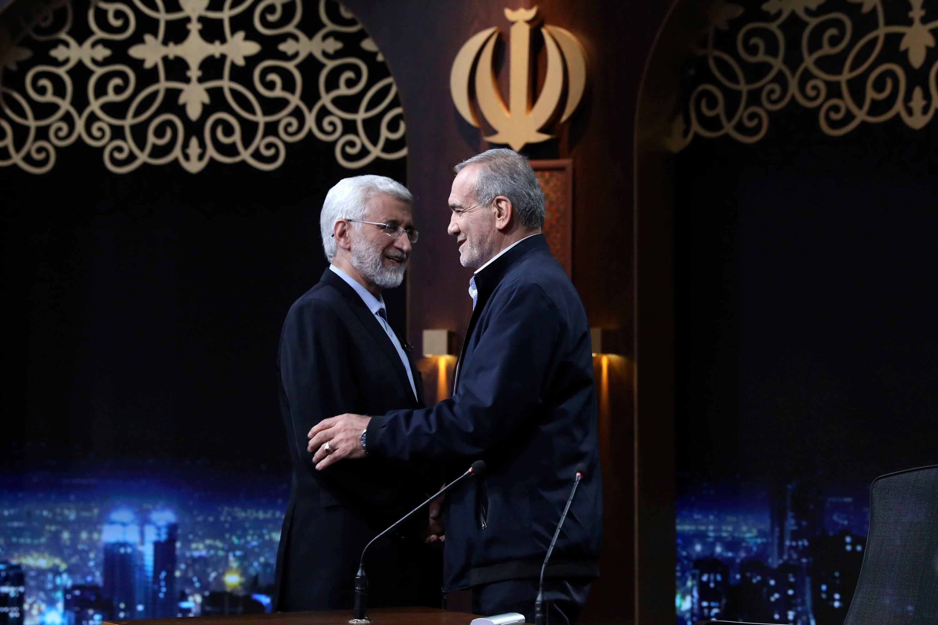Iran holds runoff presidential vote pitting hard-line former negotiator against reformist lawmaker thumbnail