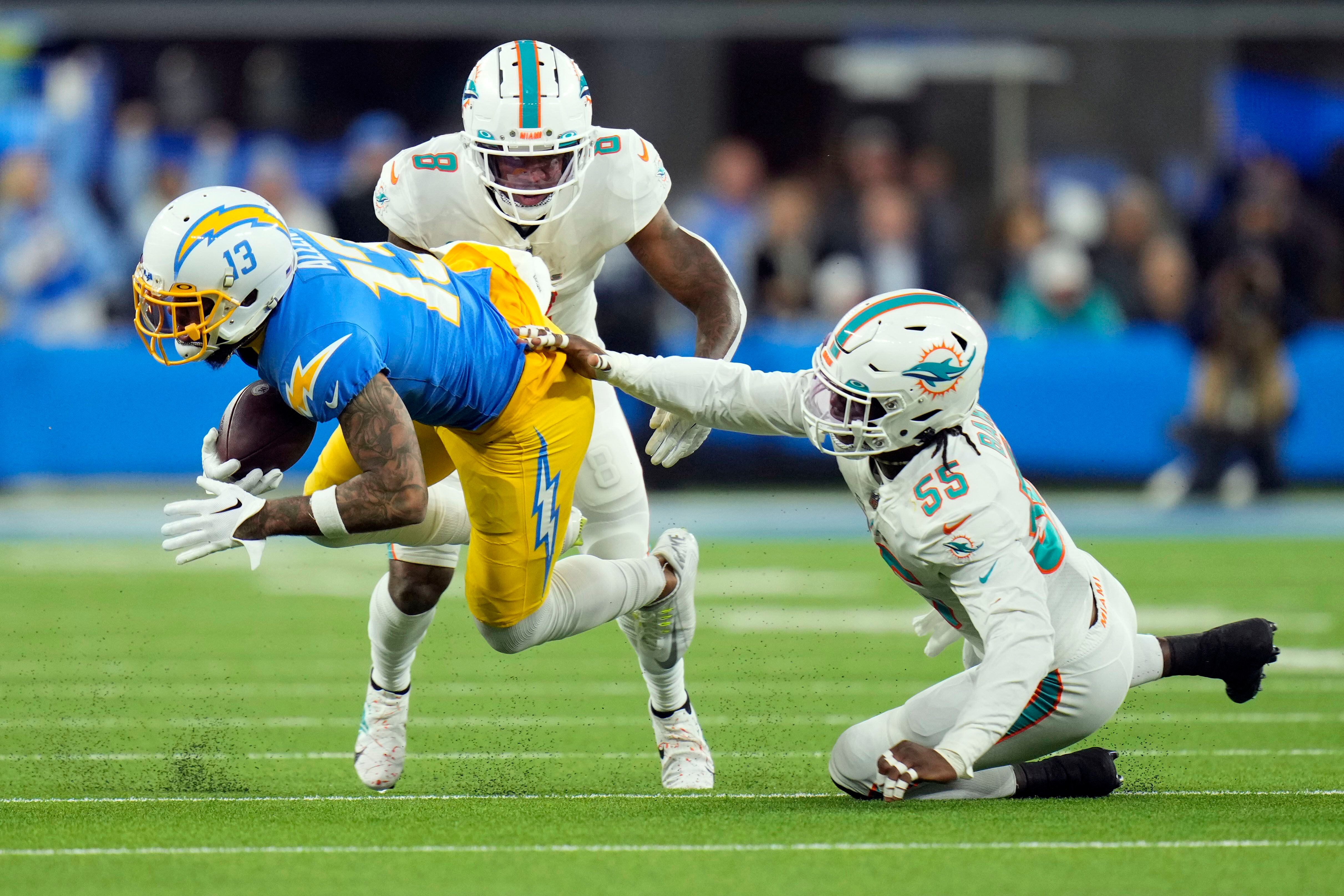 Short-handed Chargers get emotionally charged to beat Dolphins - Los  Angeles Times