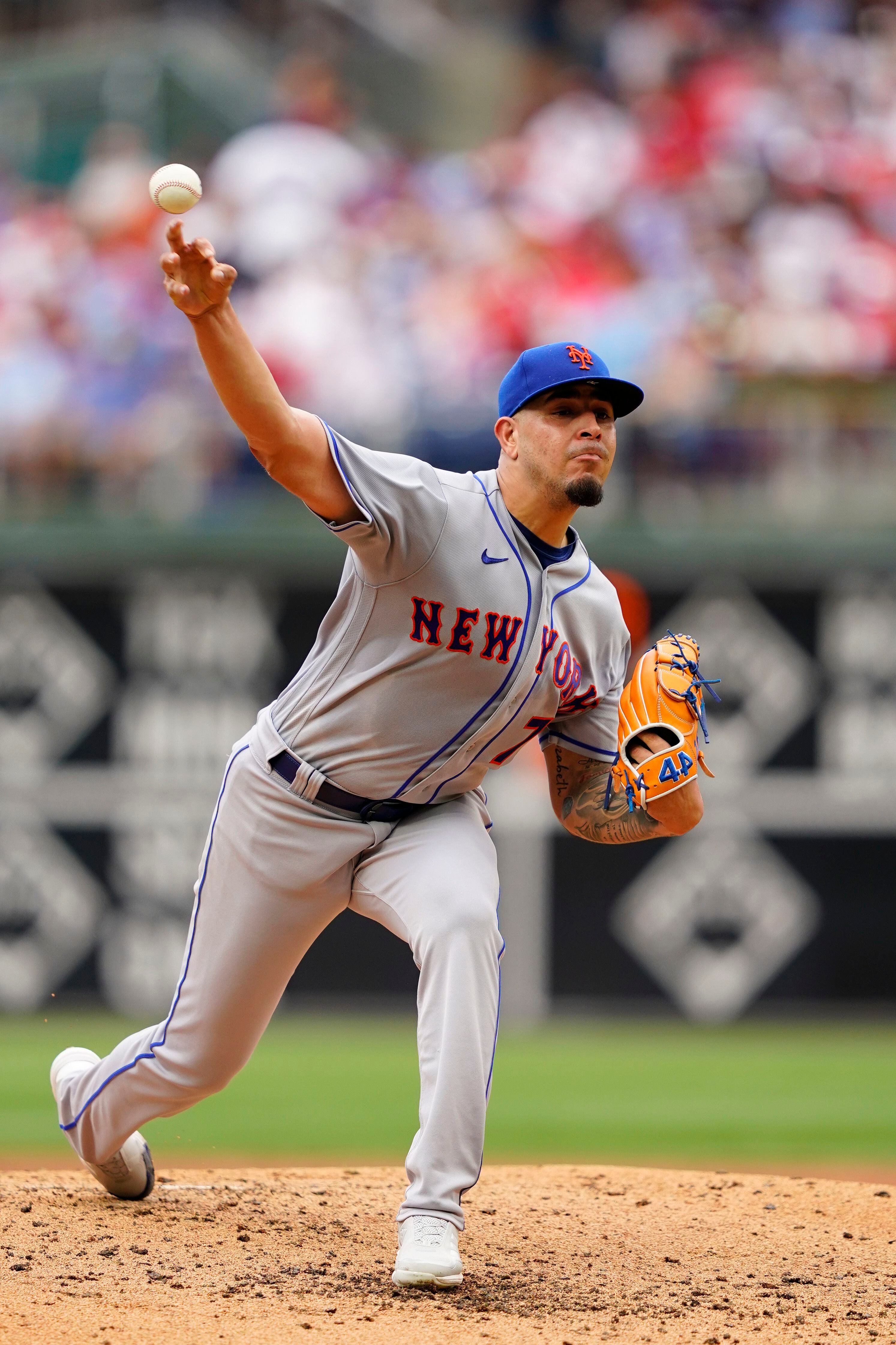 Philadelphia Phillies' Jean Segura runs to first base during the fourth  inning of a baseball gameagainst the New York Mets in the first game of a  doubleheader Tuesday, April 13, 2021, in