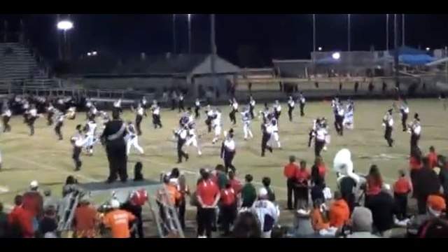 Coach To Be On Sidelines After Team Runs Through Band