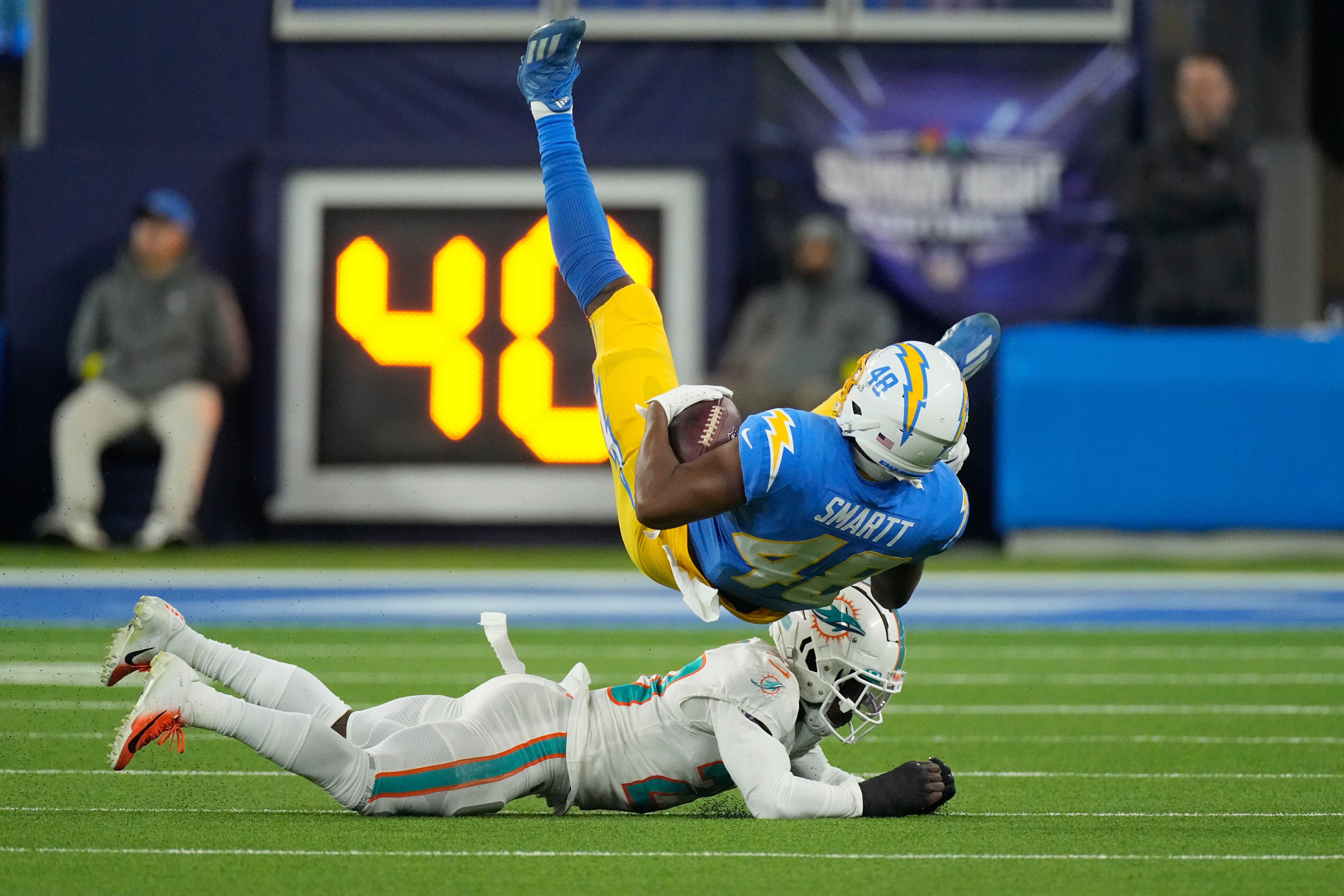 Herbert, short-handed defense lead Chargers past Fins 23-17 - The San Diego  Union-Tribune