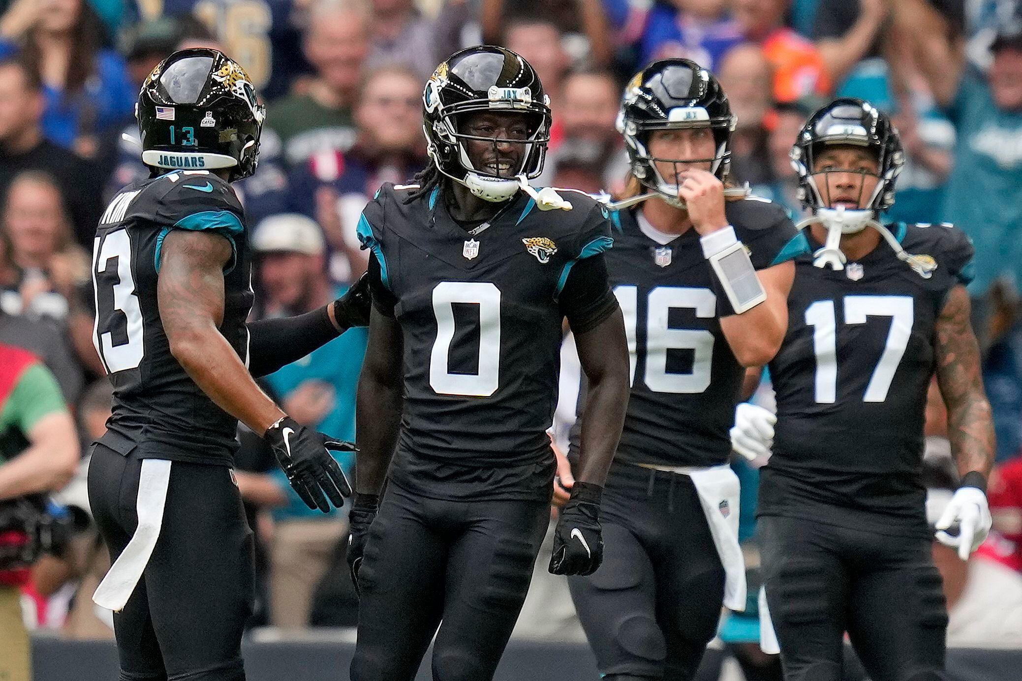 Christian Kirk of the Jacksonville Jaguars attempts a catch as Kader  News Photo - Getty Images