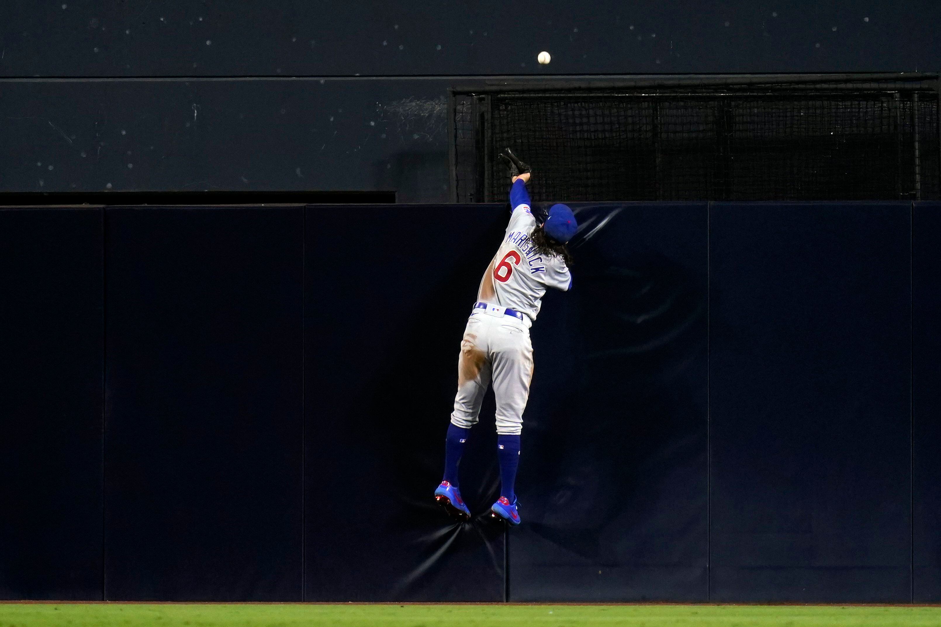 Machado, O'Grady power Padres past Cubs 9-4 in series opener