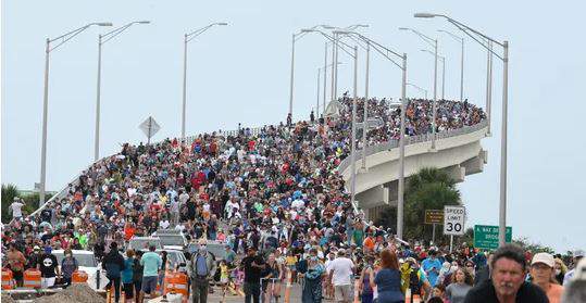 Large crowds gather for historic SpaceX launch only to see it scrubbed