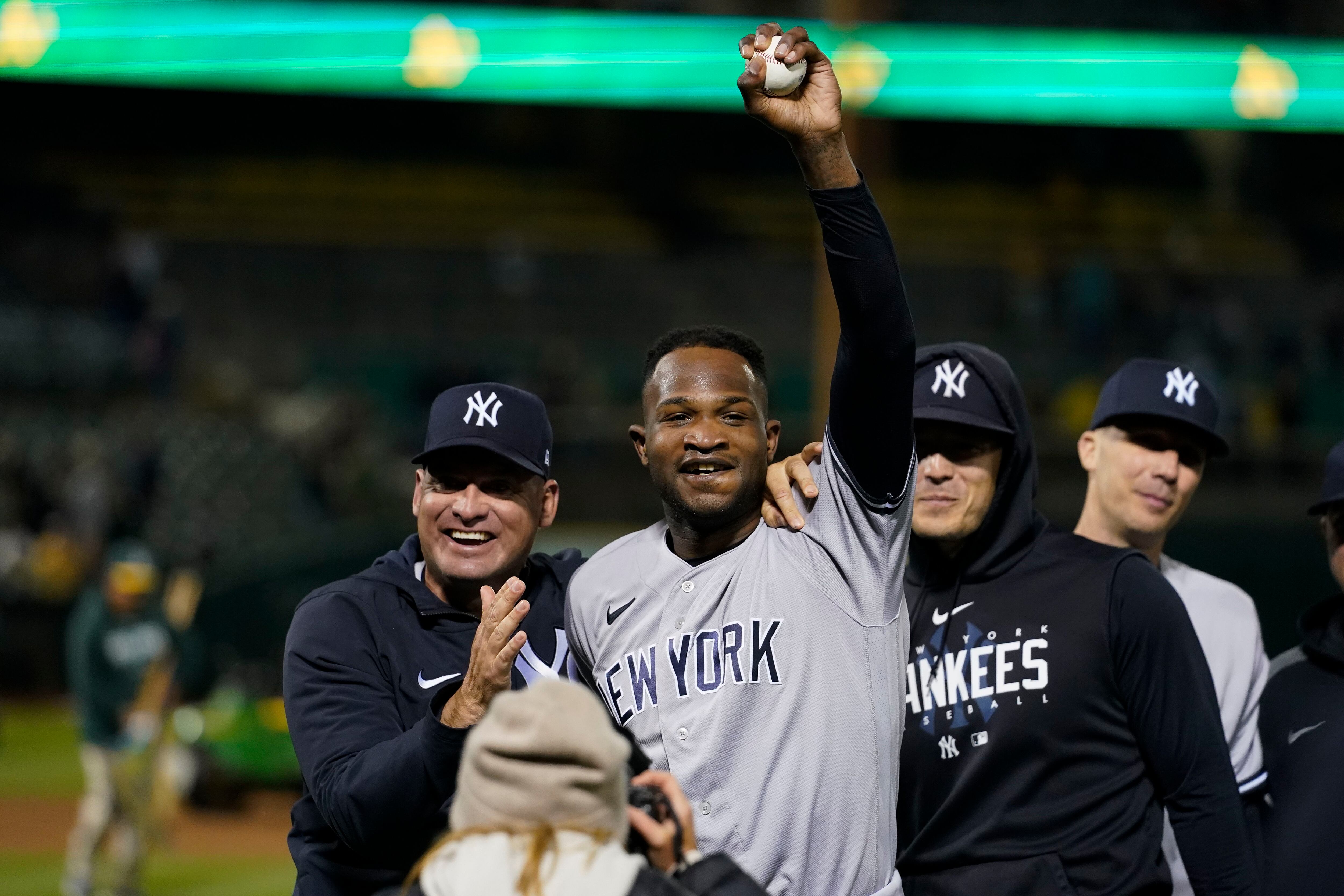 New York Yankees pitcher Orlando Hernandez walks to the dugout