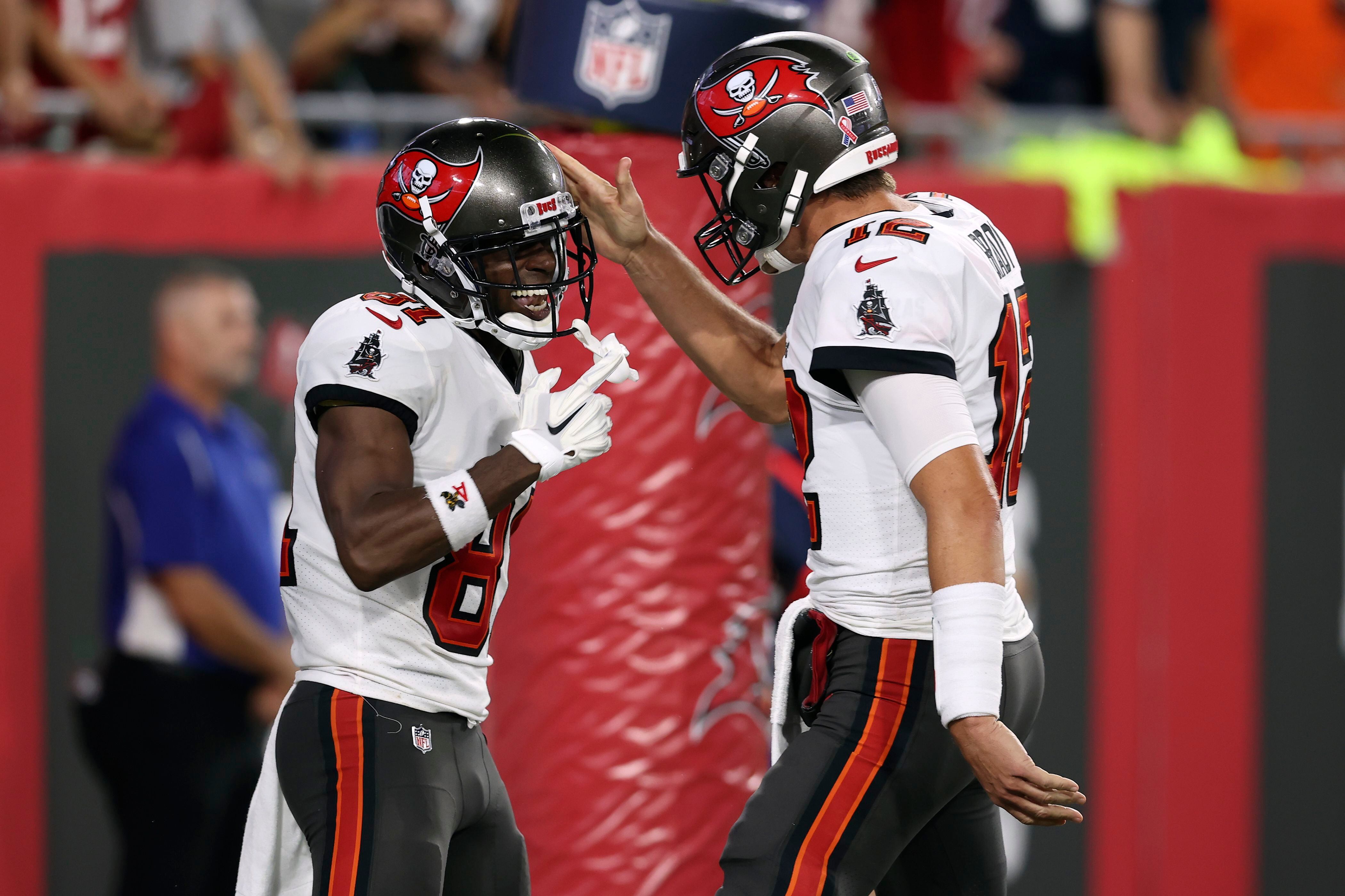 Tampa Bay Buccaneers wide receiver Antonio Brown (81) runs after catching a  pass during the first half of an NFL football game against the Dallas  Cowboys, Thursday, Sept. 9, 2021, in Tampa