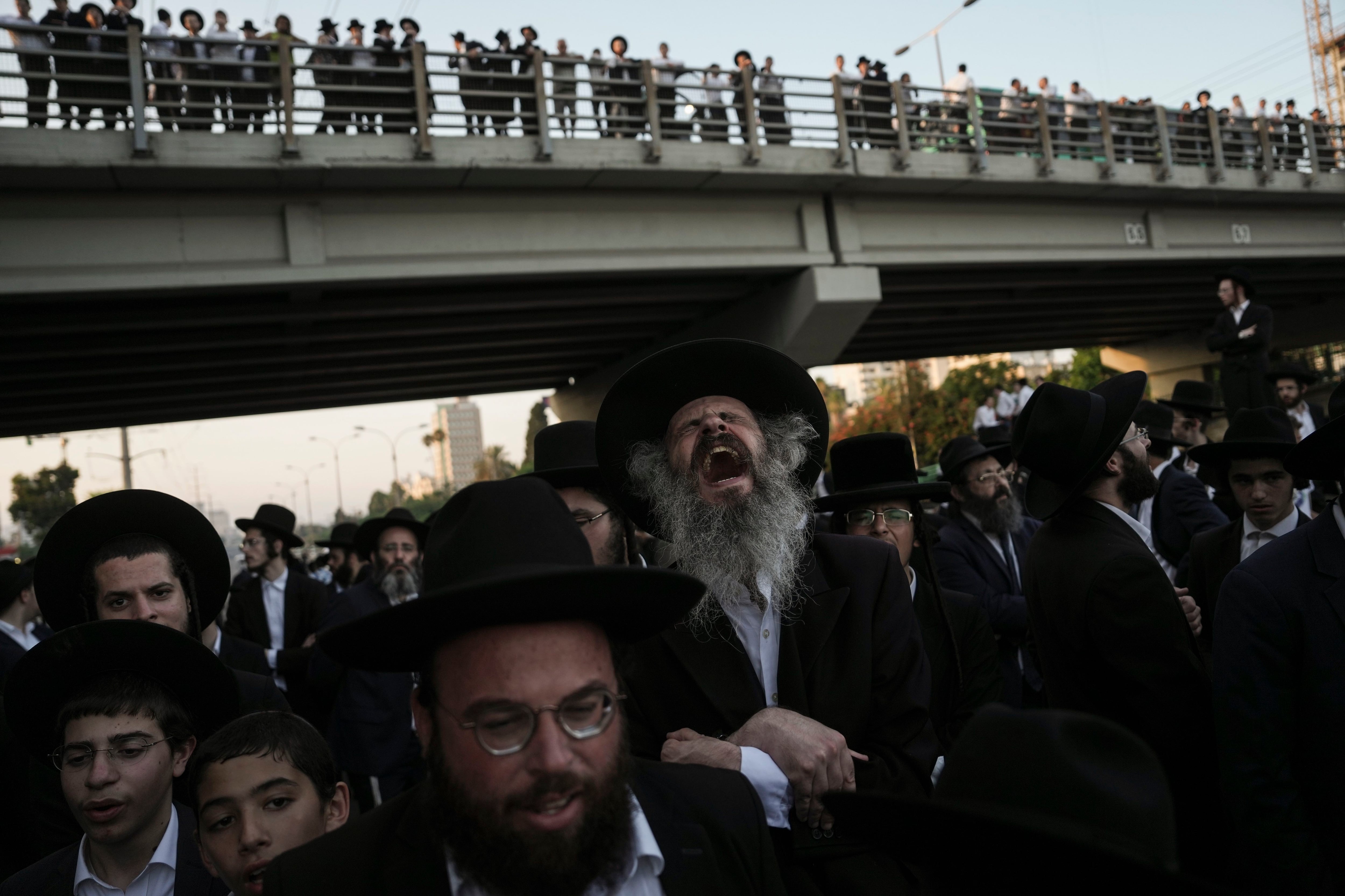 Ultra-Orthodox Jews block highway to protest Israel's new mandatory military service ruling thumbnail