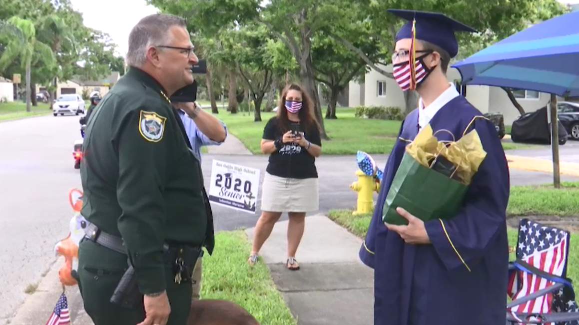 Navy recruit missing high school graduation gets surprise parade sendoff