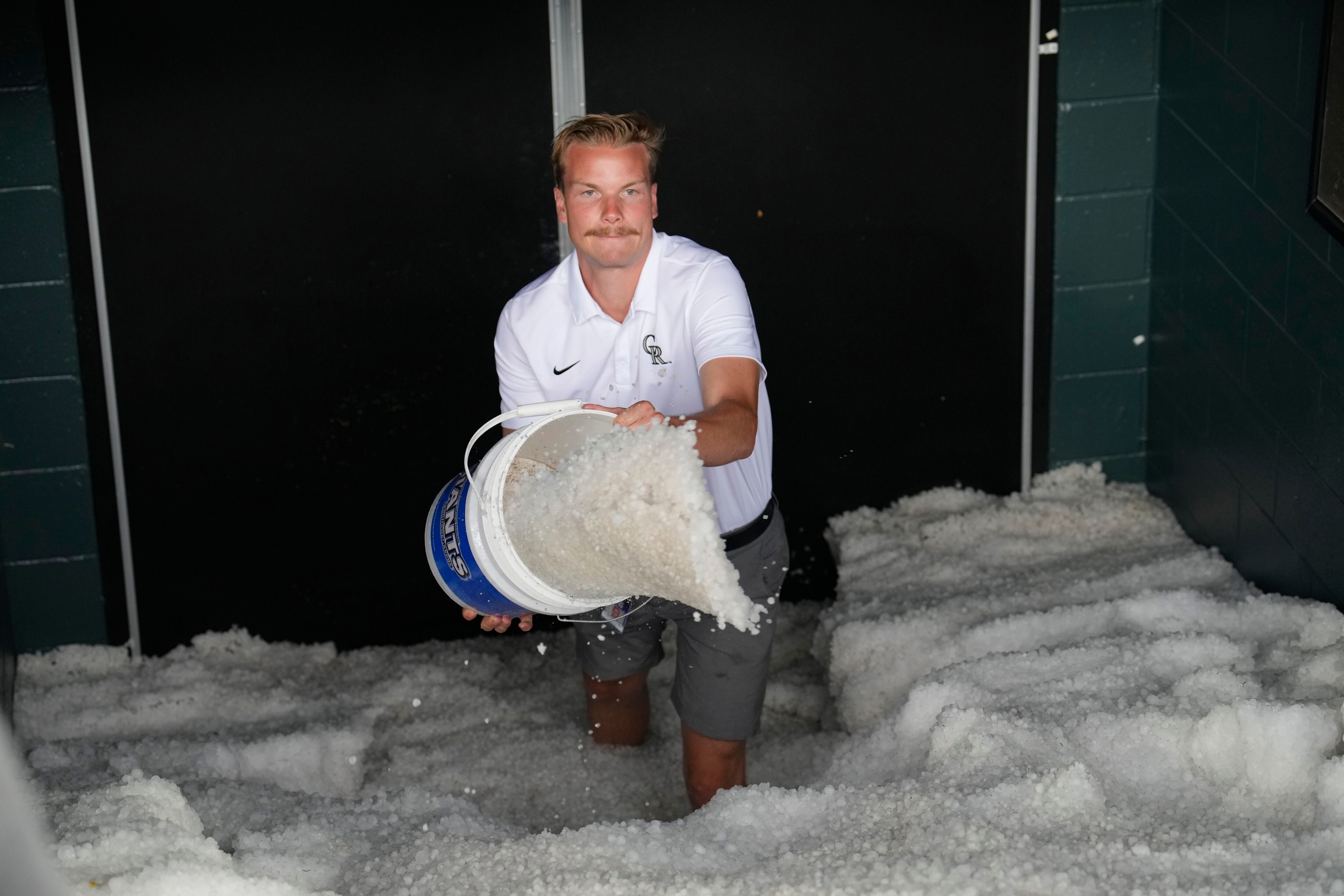 PHOTOS: Coors Field gets heavy hail dump before Rockies game vs. Dodgers –  The Denver Post