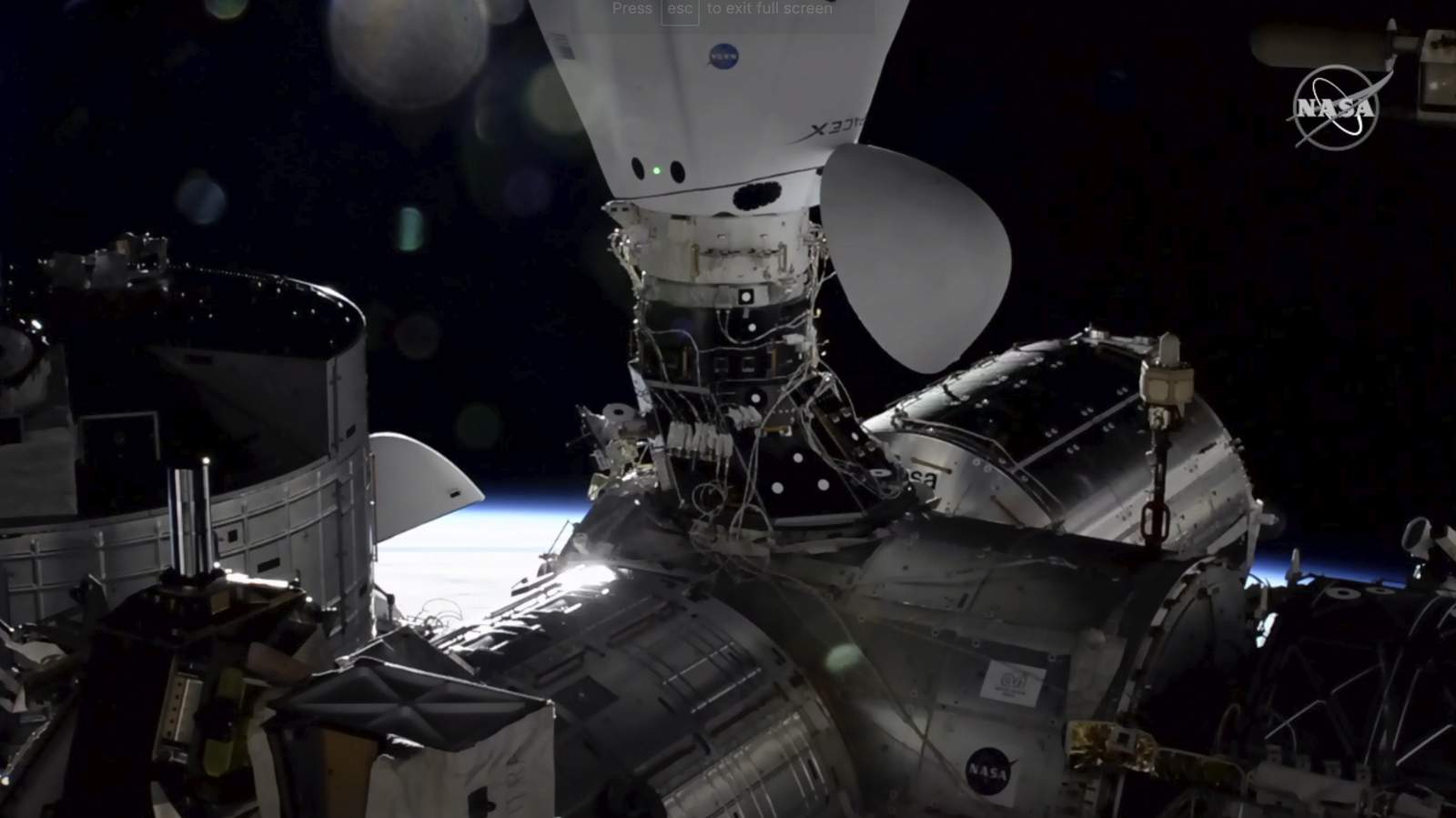 SpaceX capsules parked side-by-side at station for 1st time