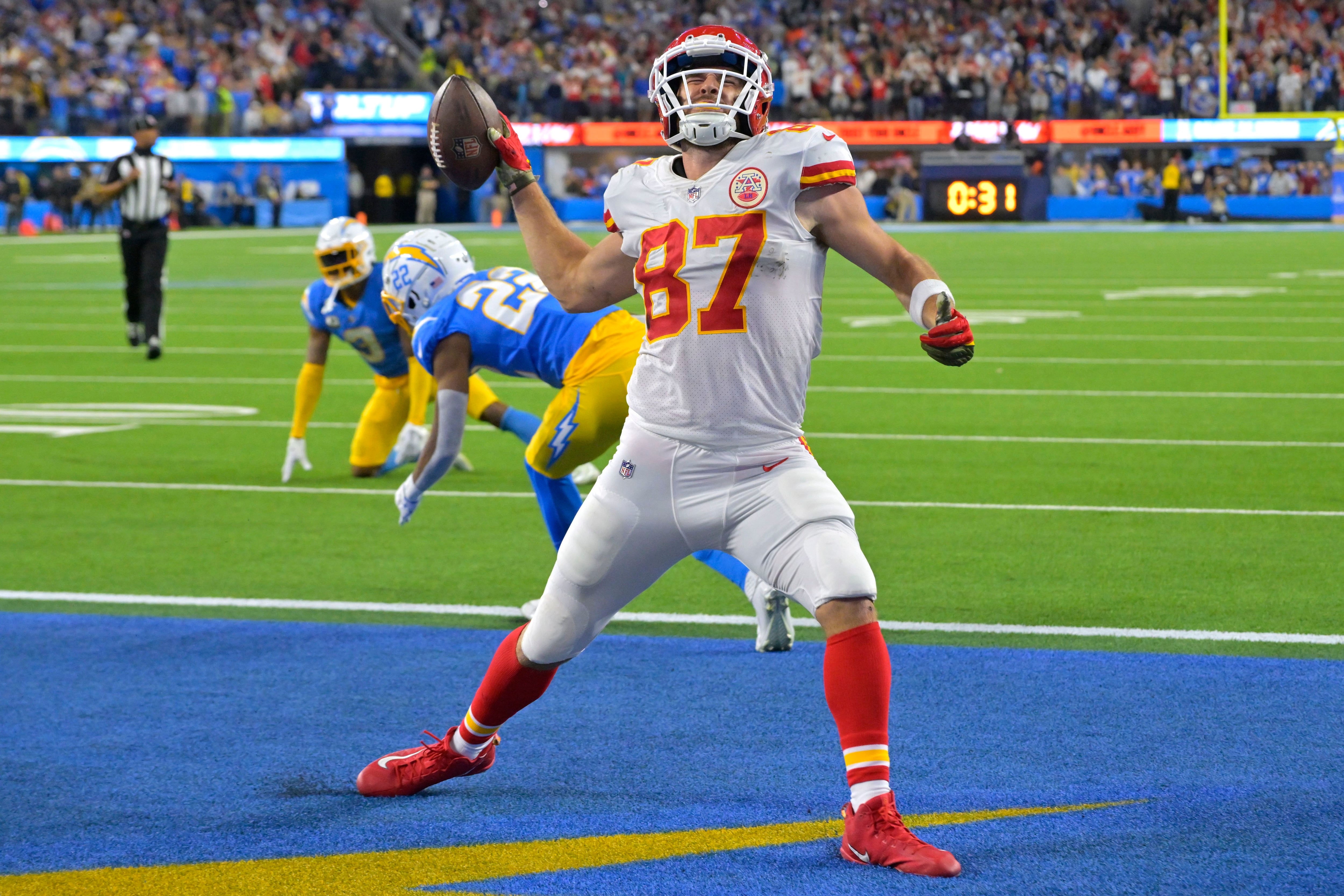 Kansas City Chiefs running back Isiah Pacheco celebrates after catching a  pass for a first down during the second half of an NFL football game  against the Los Angeles Rams Sunday, Nov.