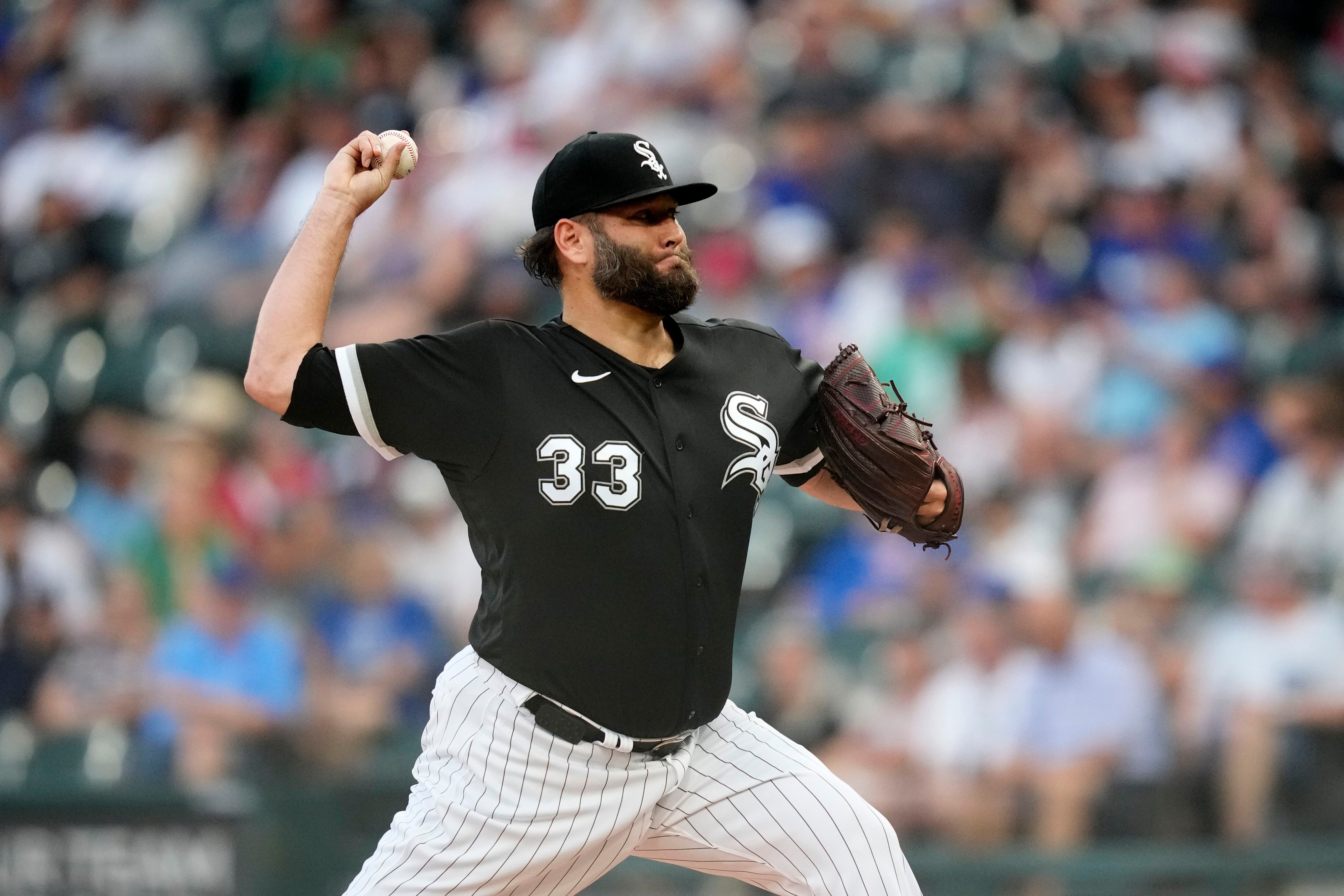 New York Yankees pitcher Orlando Hernandez delivers a pitch to the