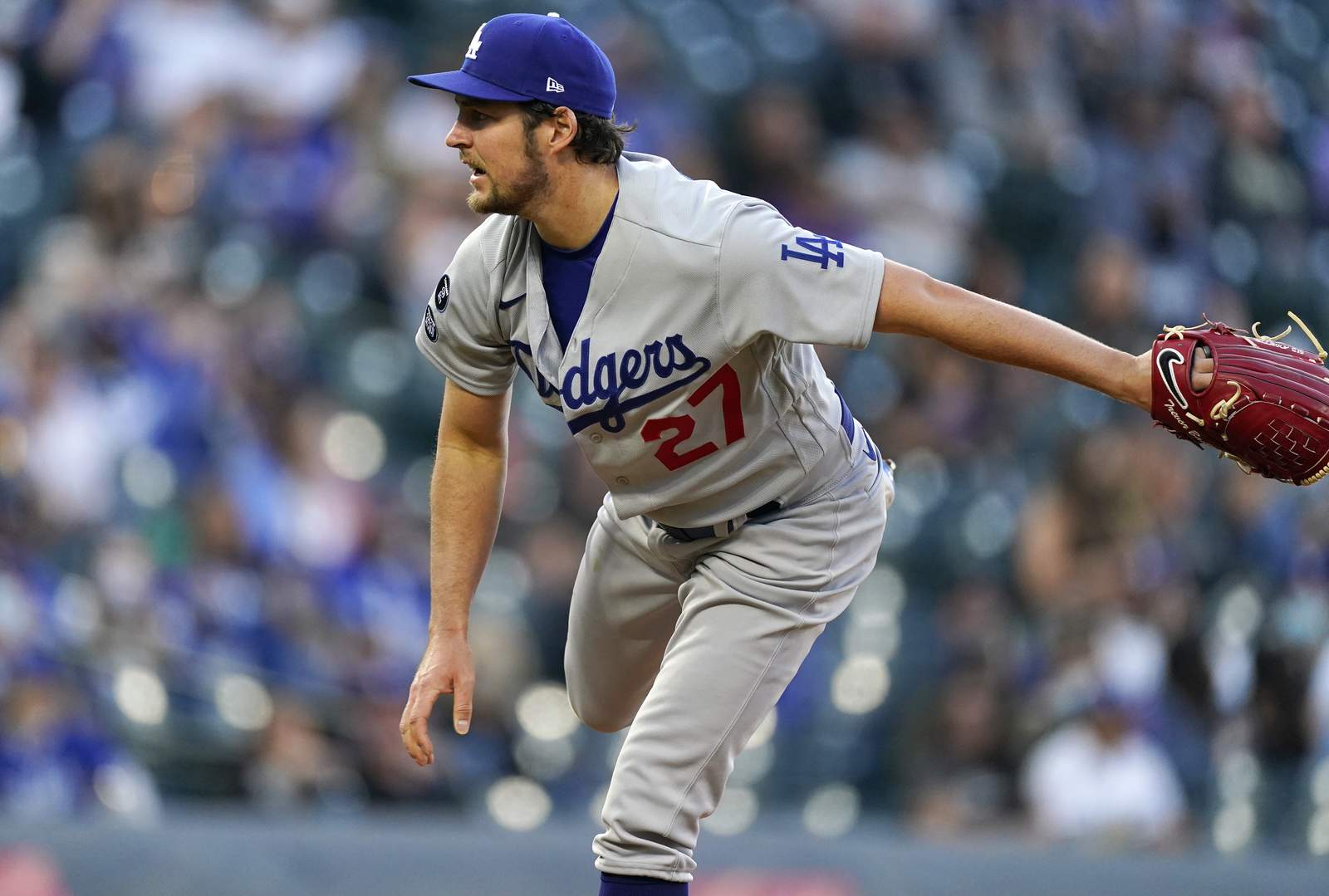 Freeman reaches 3 times, scores in Dodgers debut, beats Rox