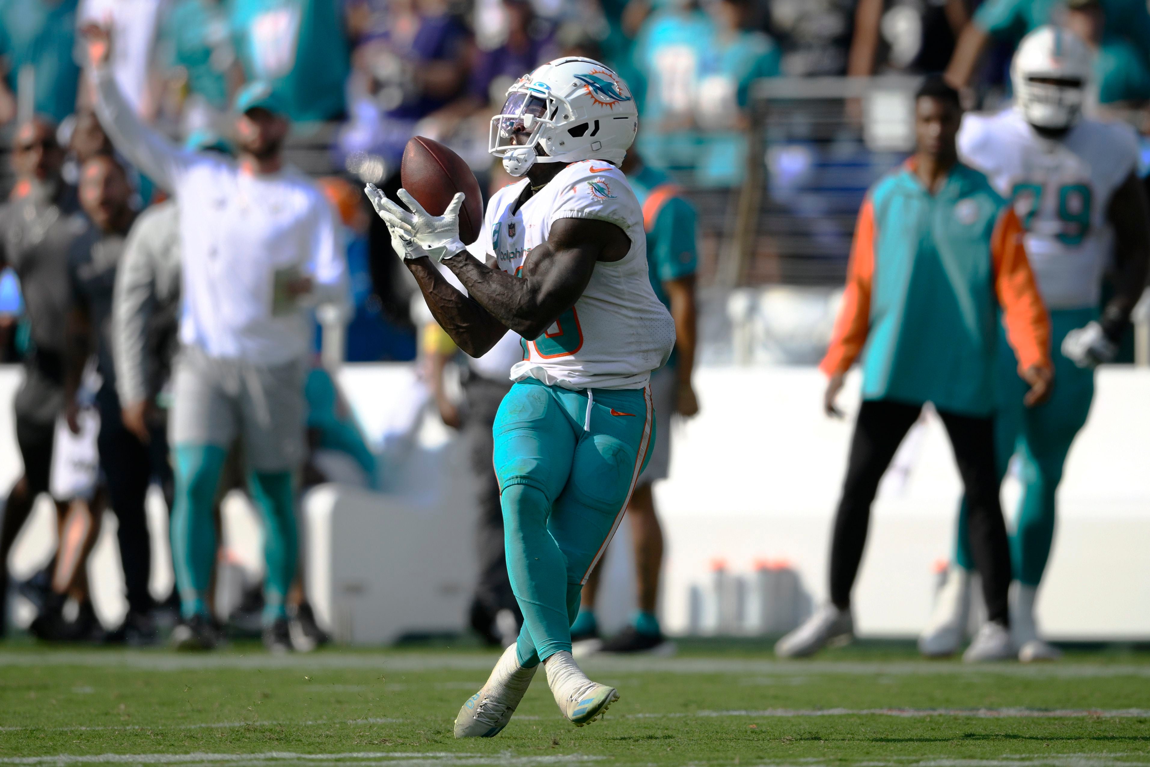 Dolphins halt Allen, survive 'butt punt' to beat Bills