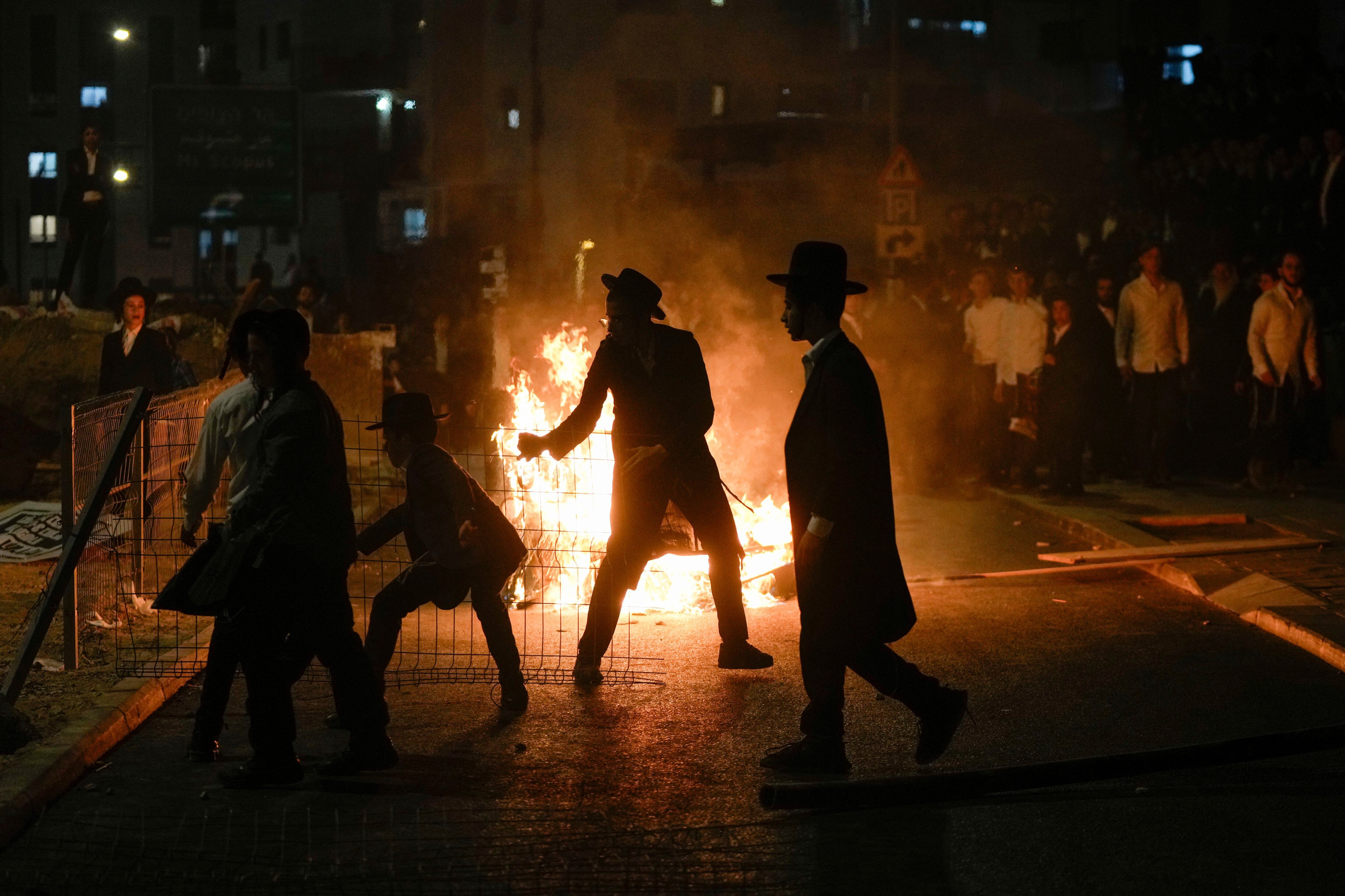Ultra-Orthodox protest against order to enlist in Israeli military turns violent in Jerusalem thumbnail