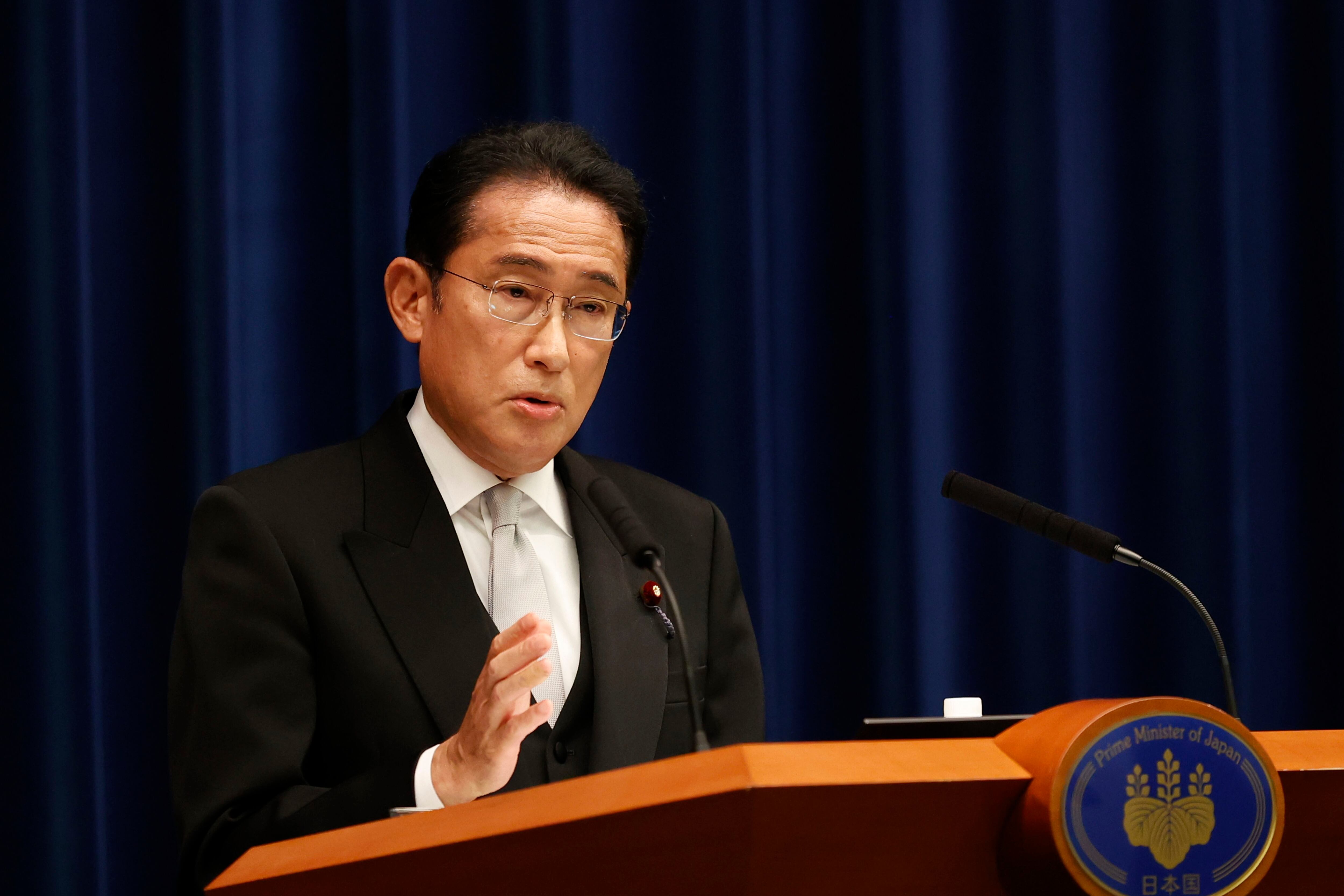 Japan PM purges Cabinet after support falls over church ties