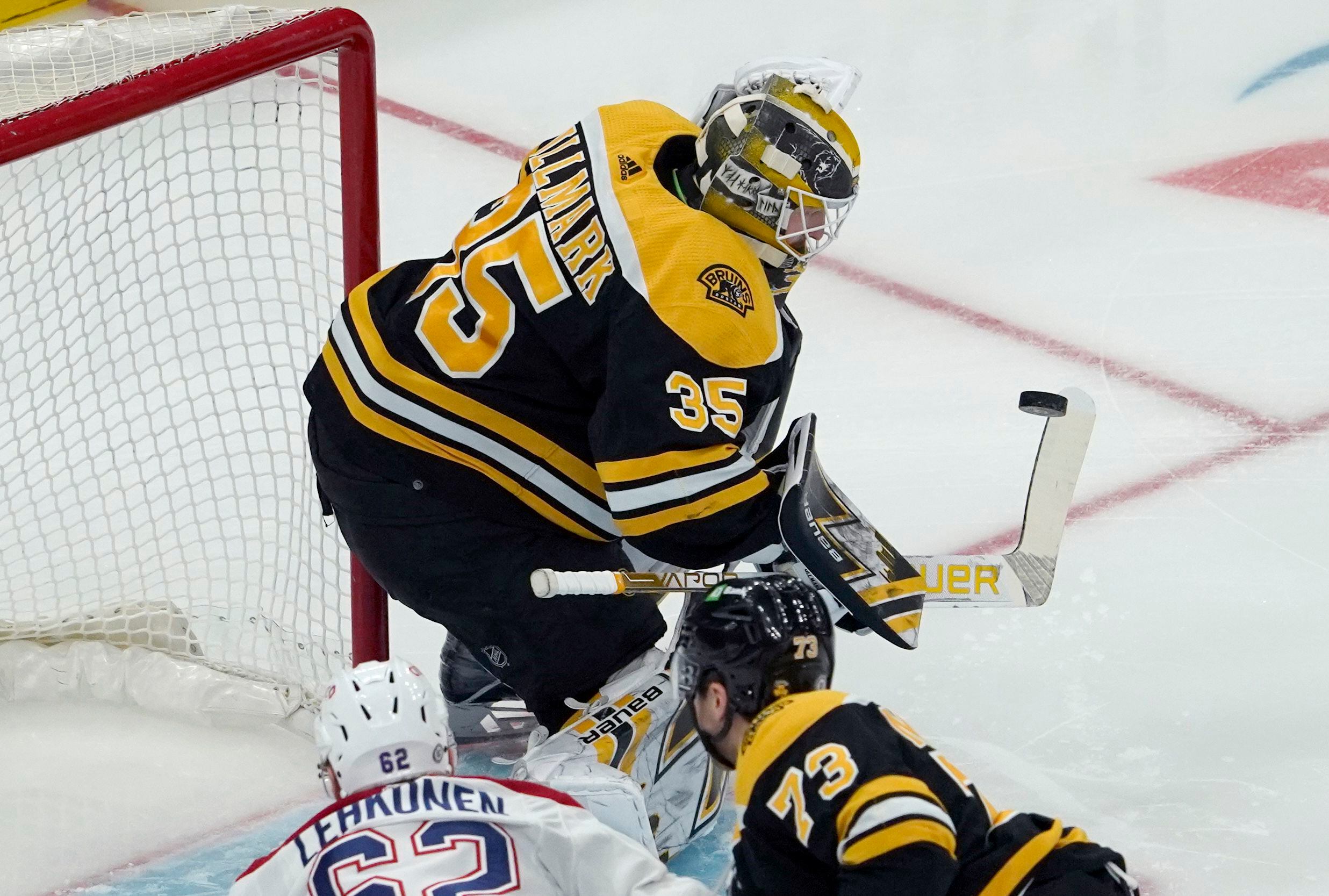 Tuukka Rask Boston Bruins Unsigned Black Jersey in Net Photograph