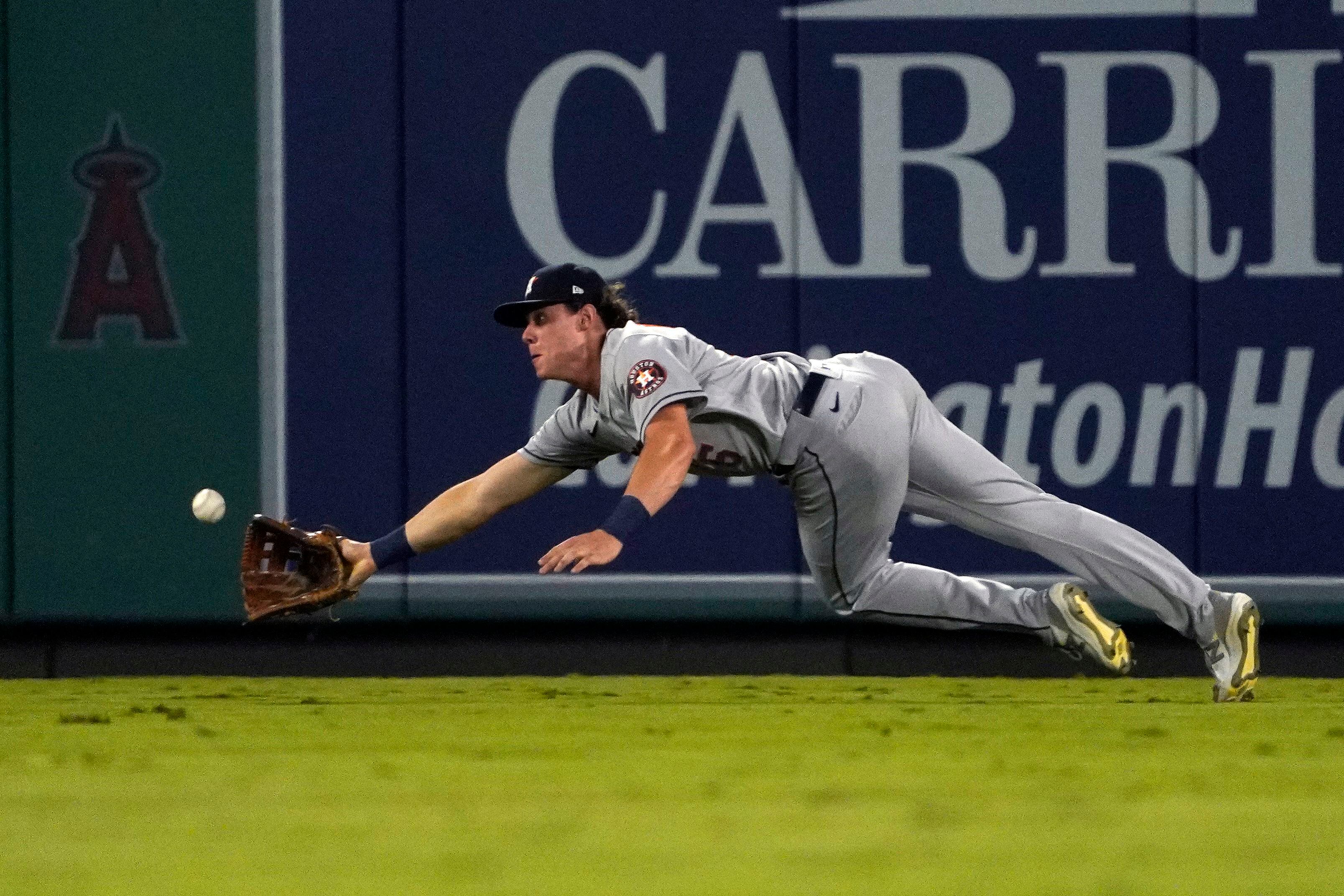 Astros move closer, beat Angels in 12; Ohtani out at plate