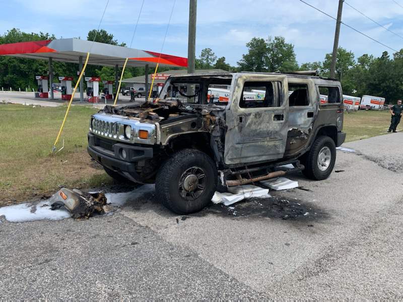 Hummer holding 4 containers of gas bursts into flames at Florida gas station after filling up