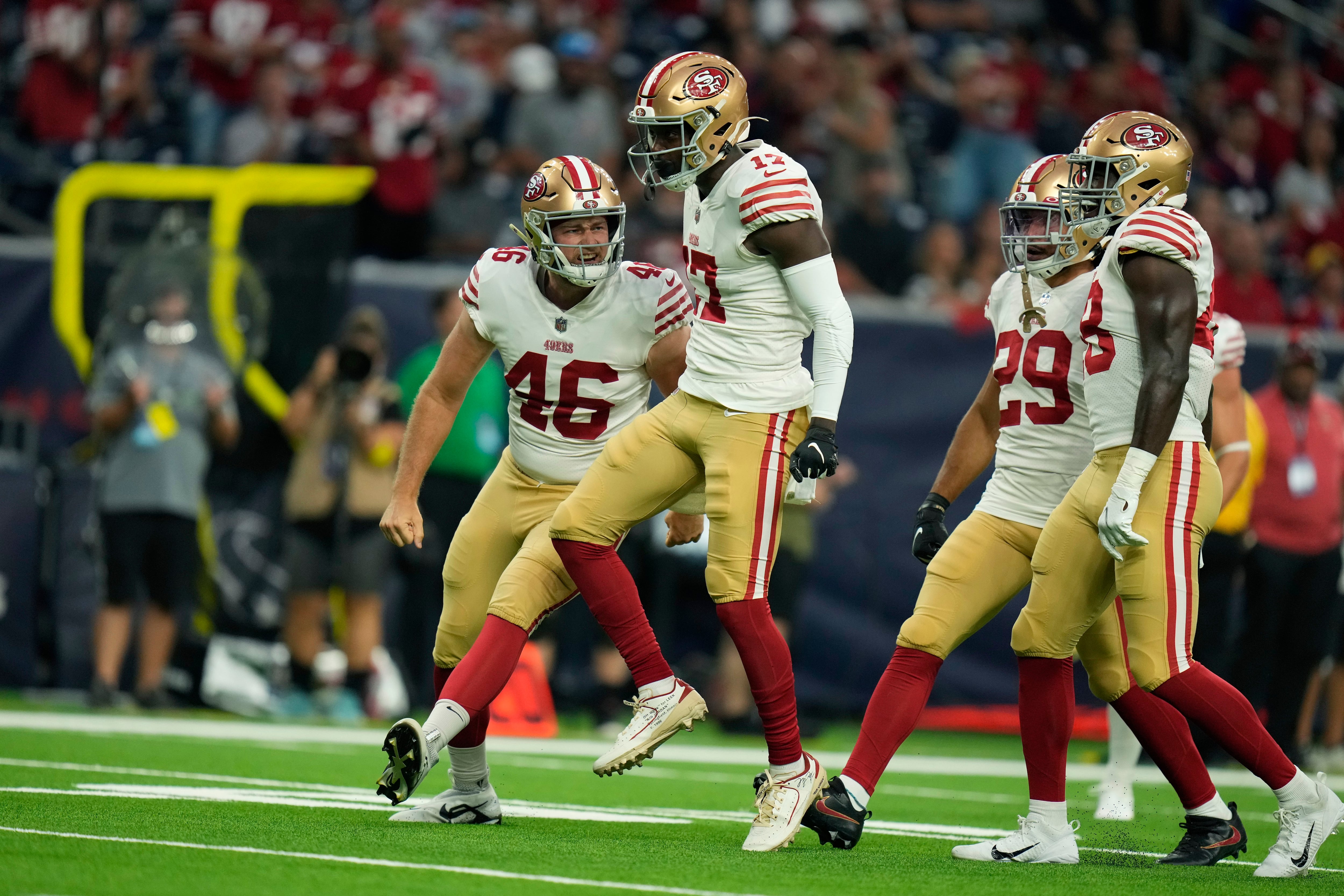 San Francisco 49ers linebacker Segun Olubi (49) looks on during