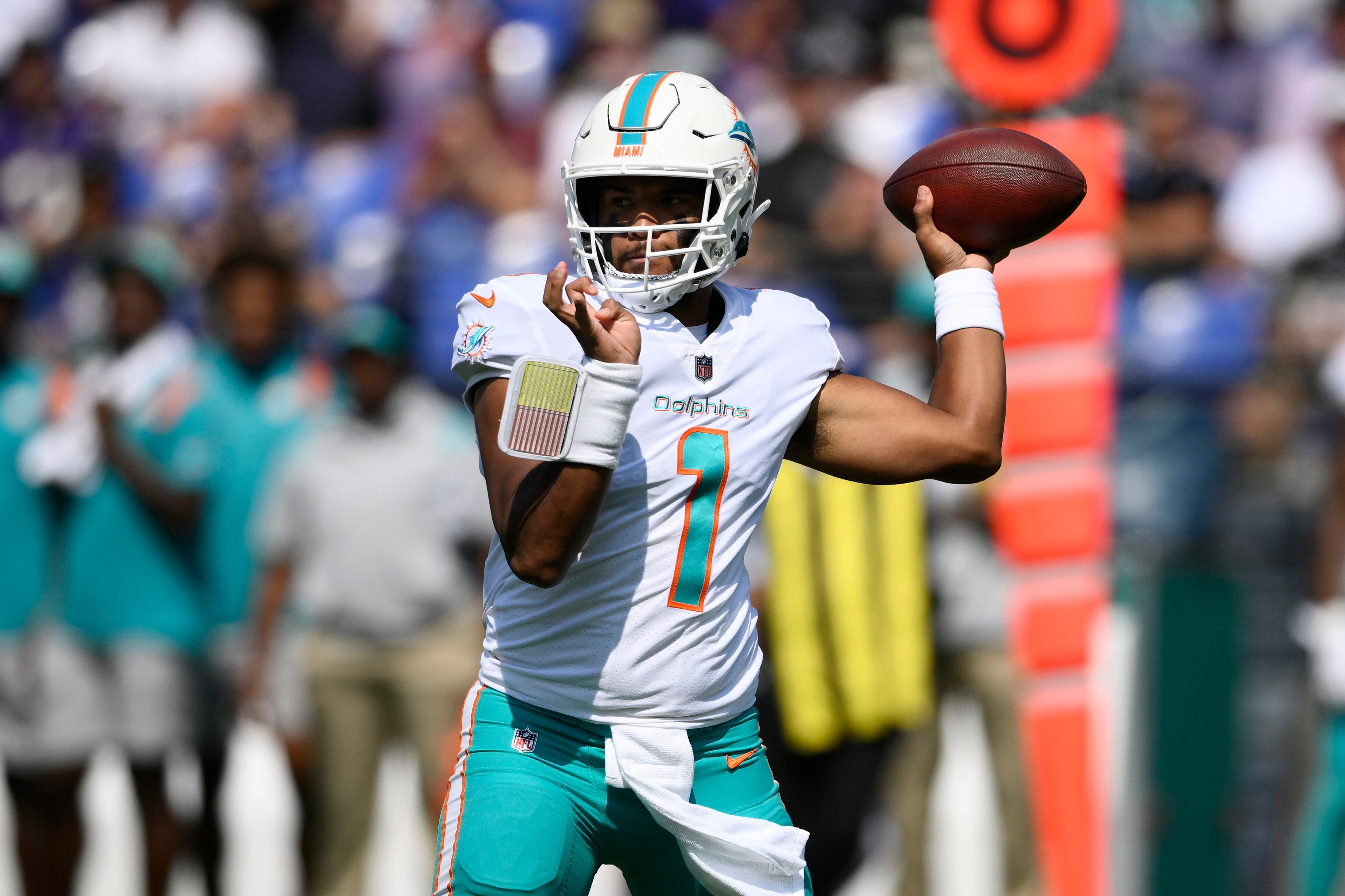 Dolphins halt Allen, survive 'butt punt' to beat Bills