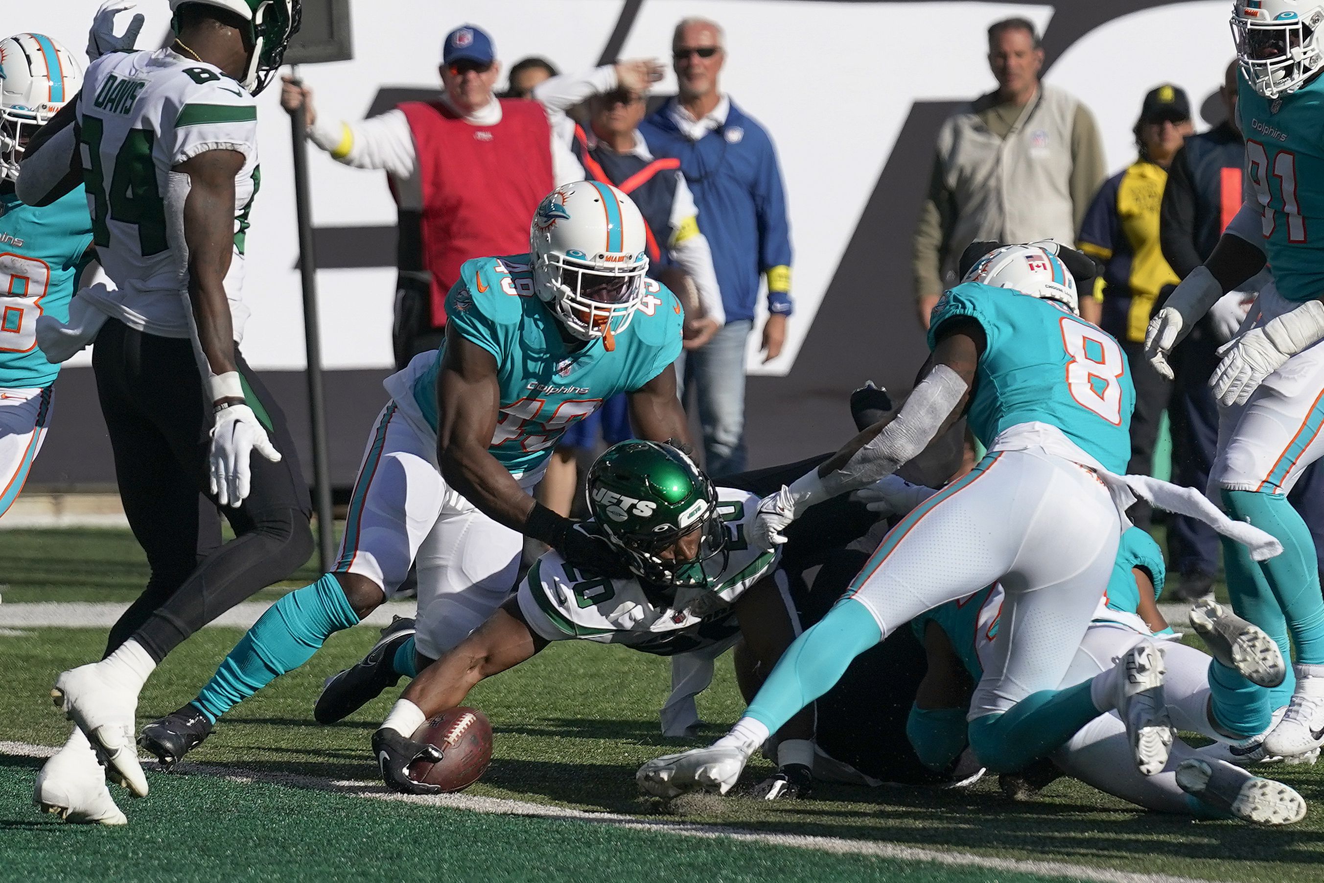 East Rutherford, New Jersey, USA. 9th Oct, 2022. Miami Dolphins quarterback  Teddy Bridgewater (5) is tackled by New York Jets cornerback Sauce Gardner  (1) in the end zone and called for a