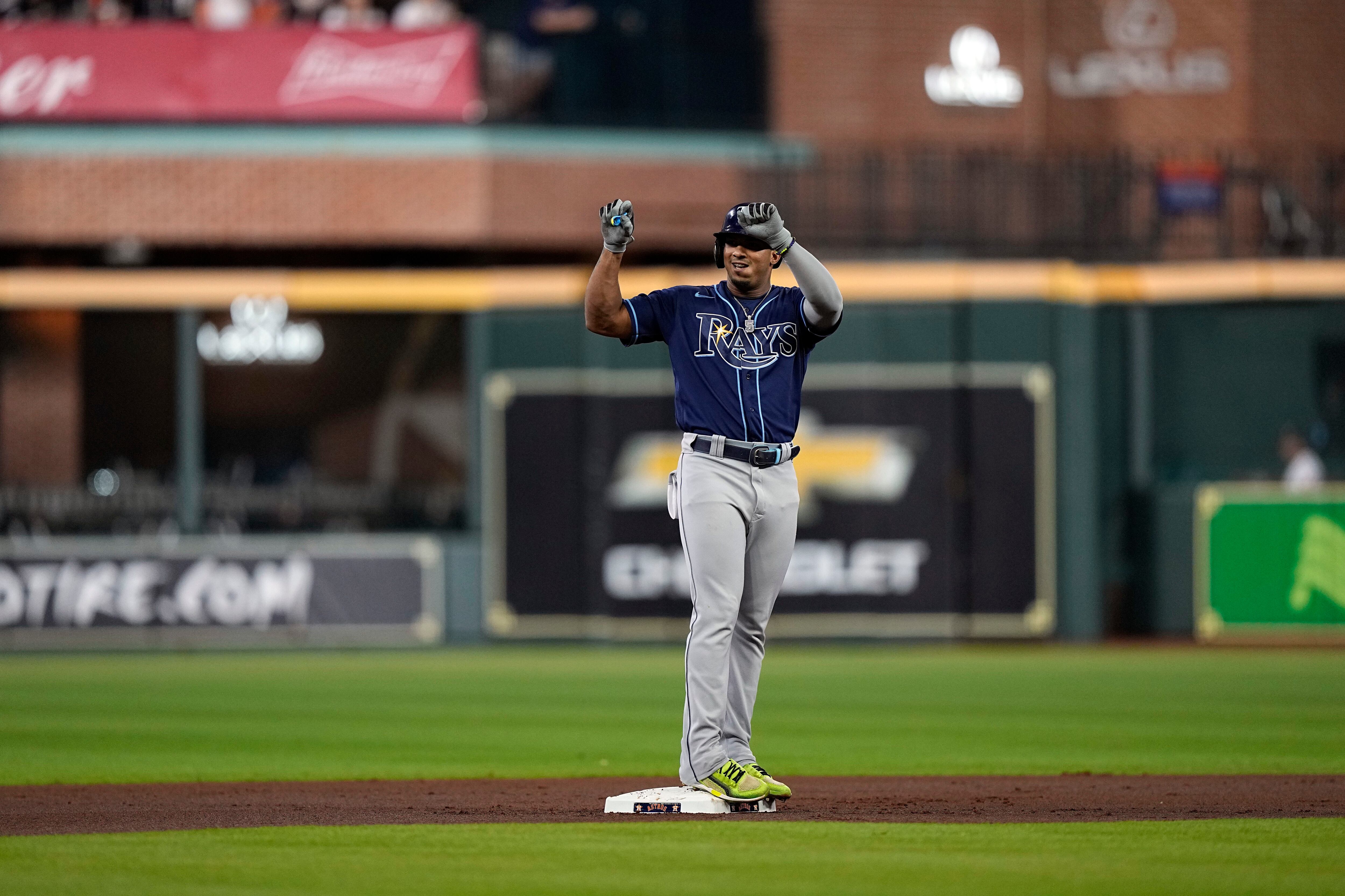 Jose Siri of the Houston Astros makes a catch on a fly ball by Myles