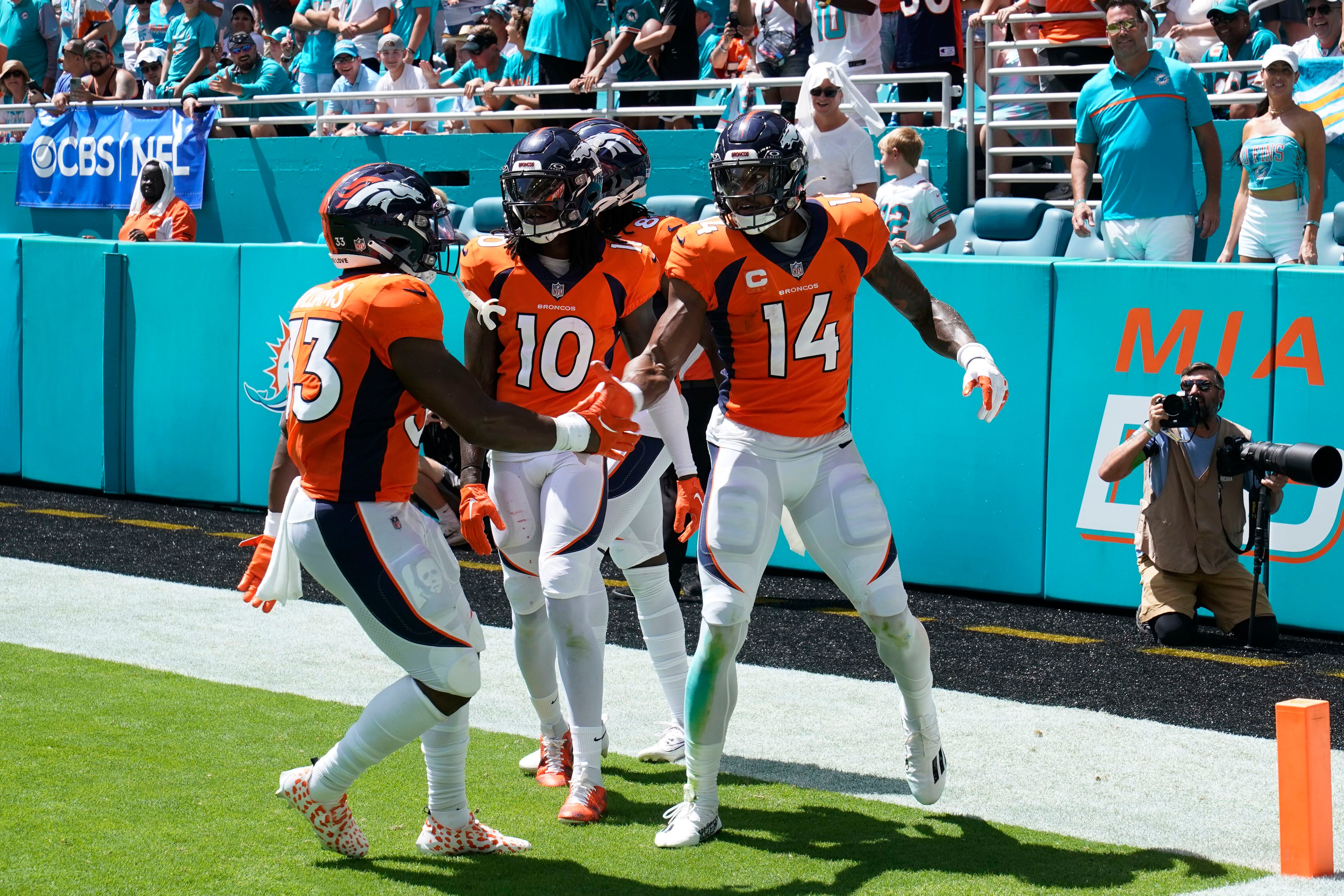 Tagovailoa, Dolphins score most points by NFL team since 1966 in 70-20 win  over Wilson, Broncos, Sports