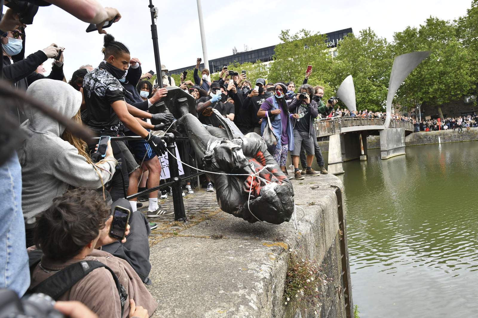 Watery end for statue of slave trader in UK city of Bristol